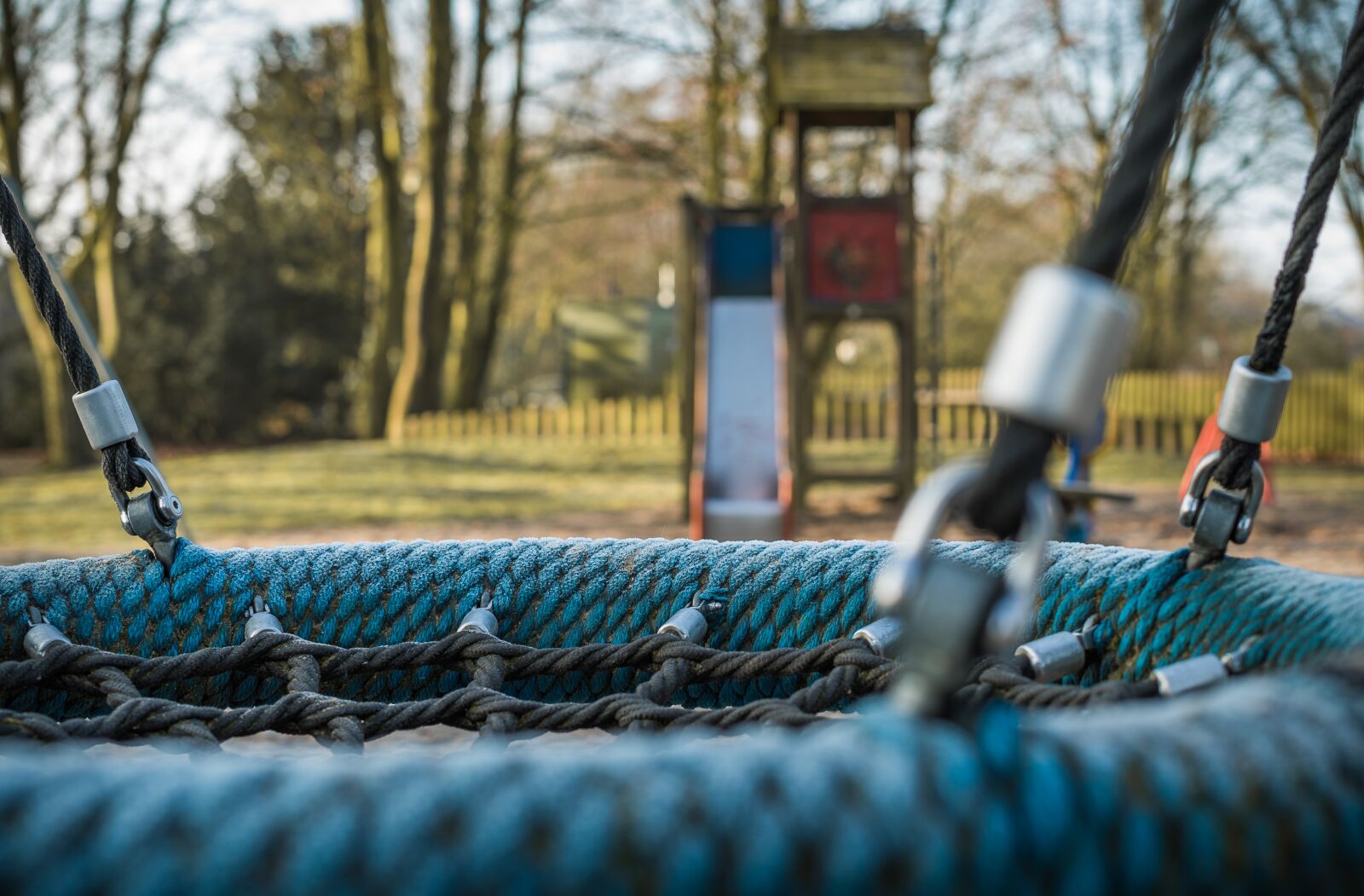 Sony a7S II + Sony FE 50mm F1.8 sample photo. Playground, swing, dew photography