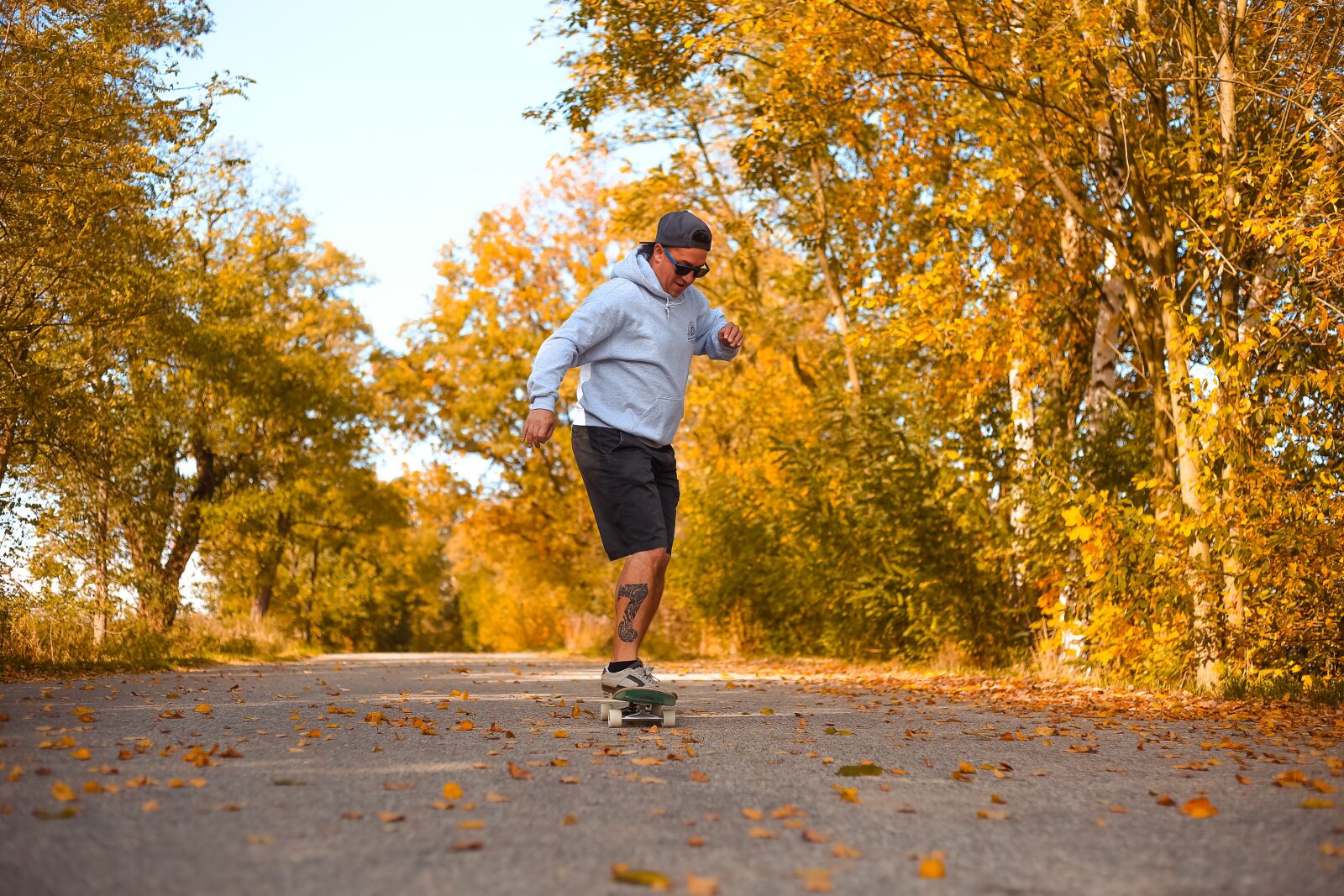 Canon EF 50mm F1.8 II sample photo. Skateboard, man, autumn photography