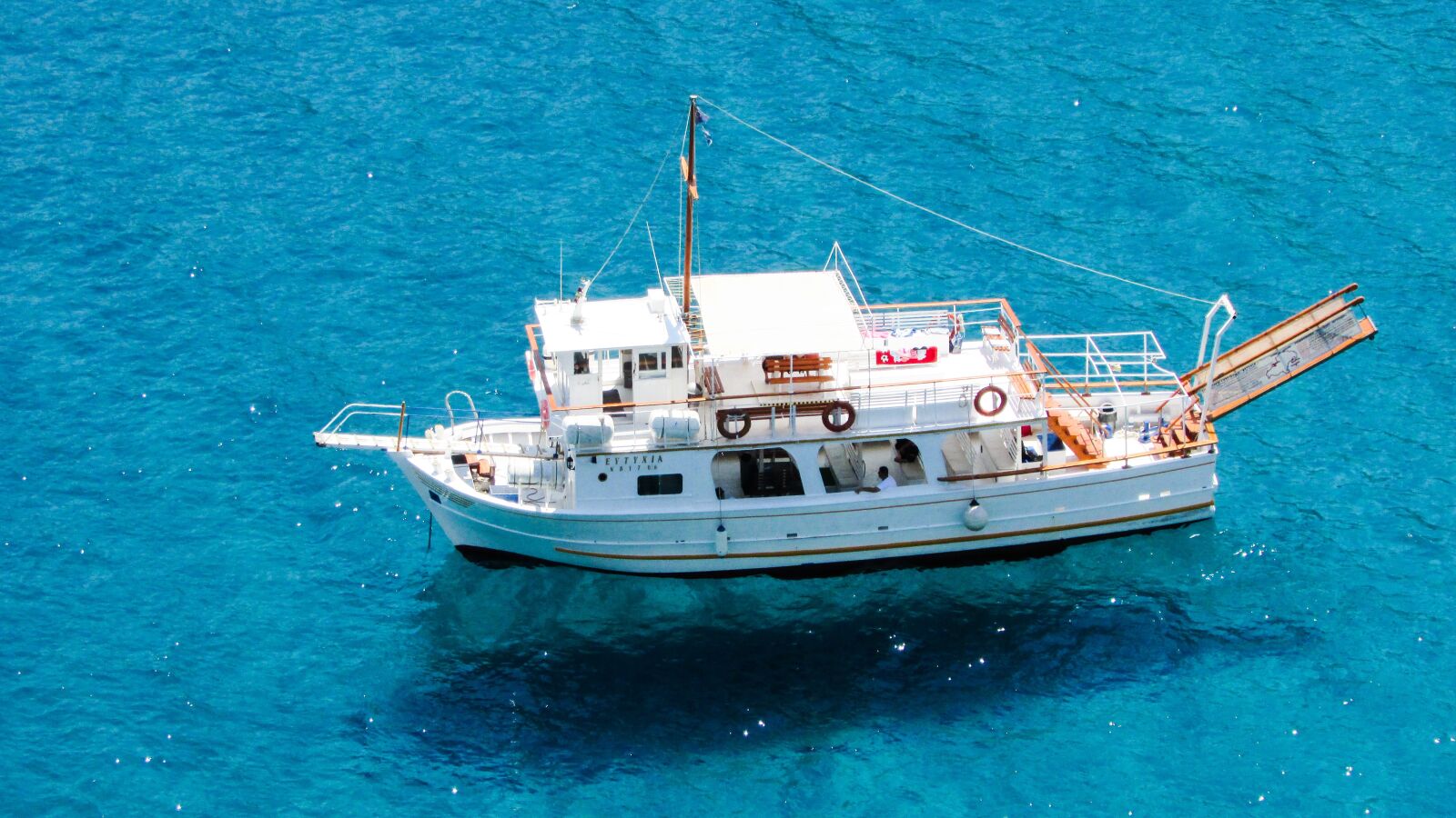 Canon PowerShot SX400 IS sample photo. Boat, floating, shadow photography