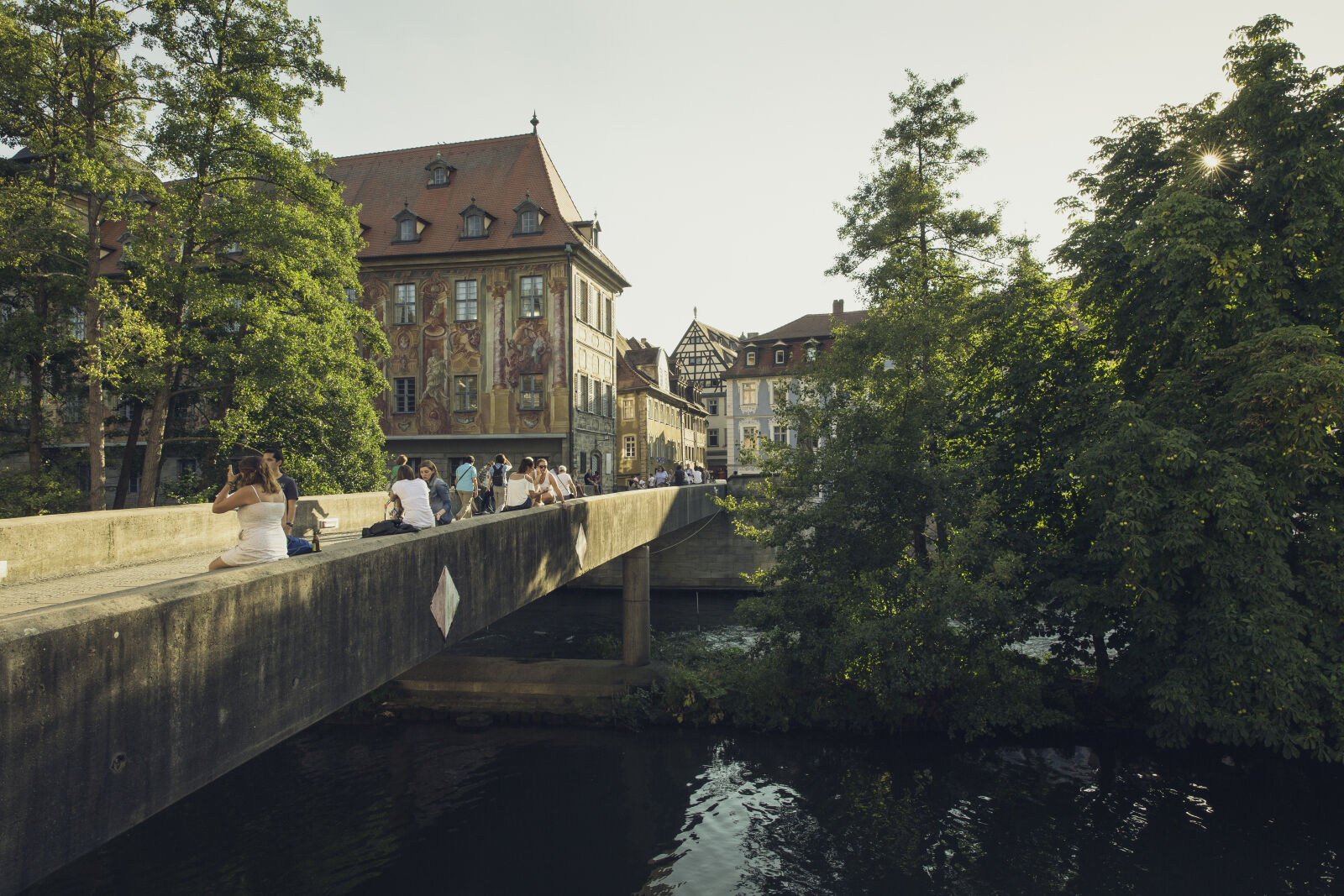 Canon EF 24-70mm F2.8L II USM sample photo. City, houses, people, water photography