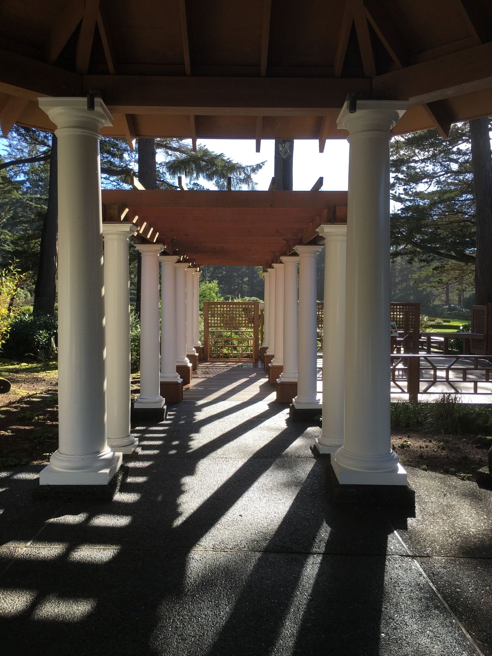 Apple iPhone 6s Plus sample photo. Perspective, colonade, archeology photography