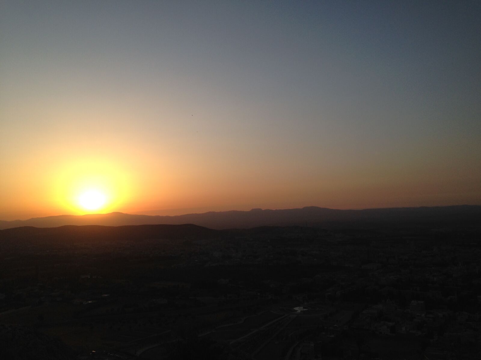 iPhone 5c back camera 4.12mm f/2.4 sample photo. Lying, sun, mountain photography