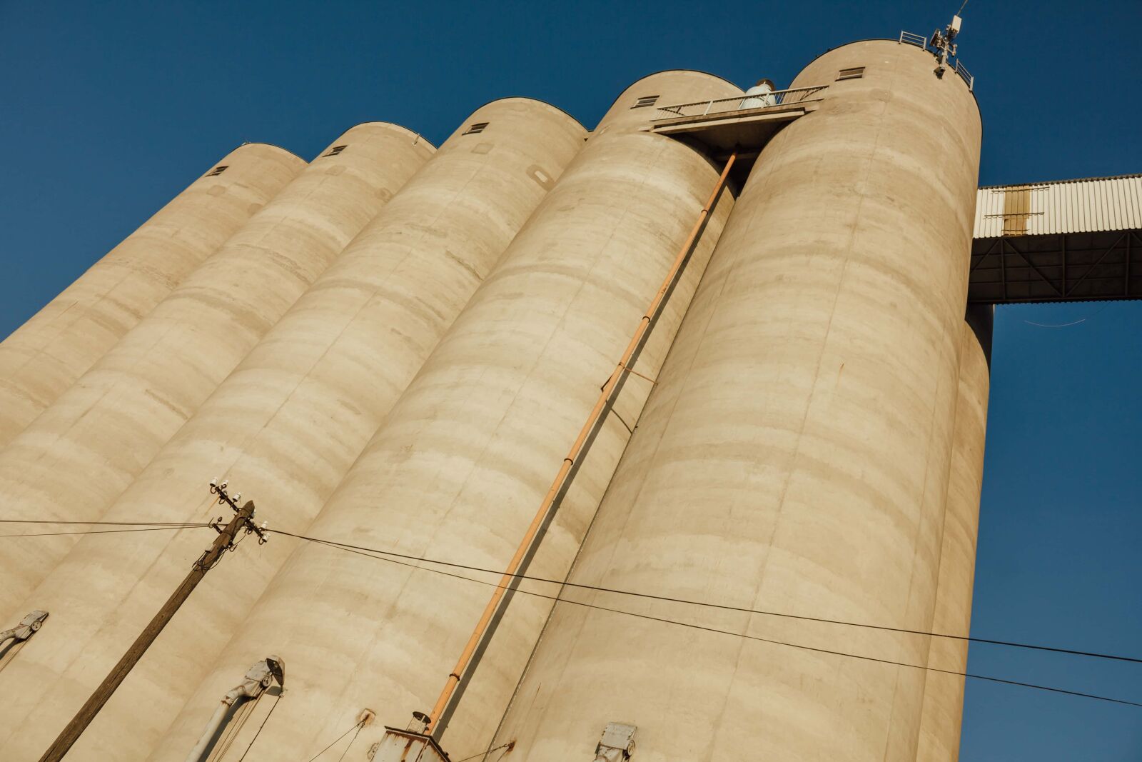 Canon EF-S 18-55mm F3.5-5.6 IS sample photo. Silo, tall, buildings, industry photography