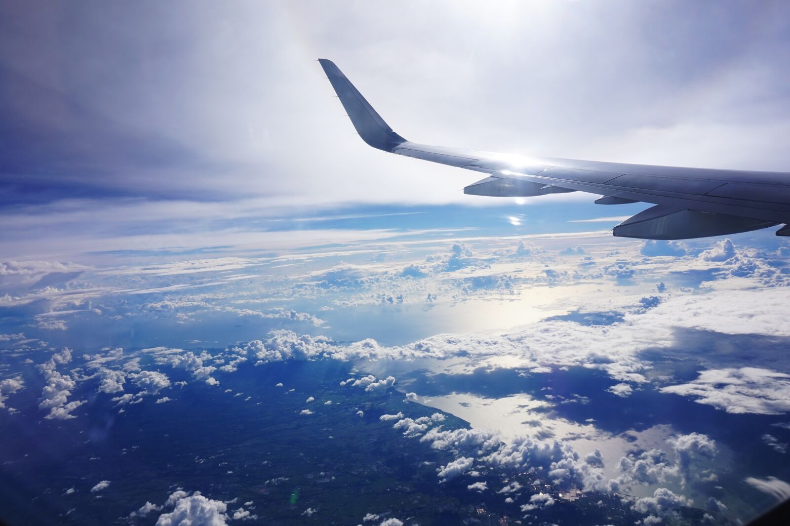 Sony Alpha a5000 (ILCE 5000) sample photo. Plane, flight, cloud photography