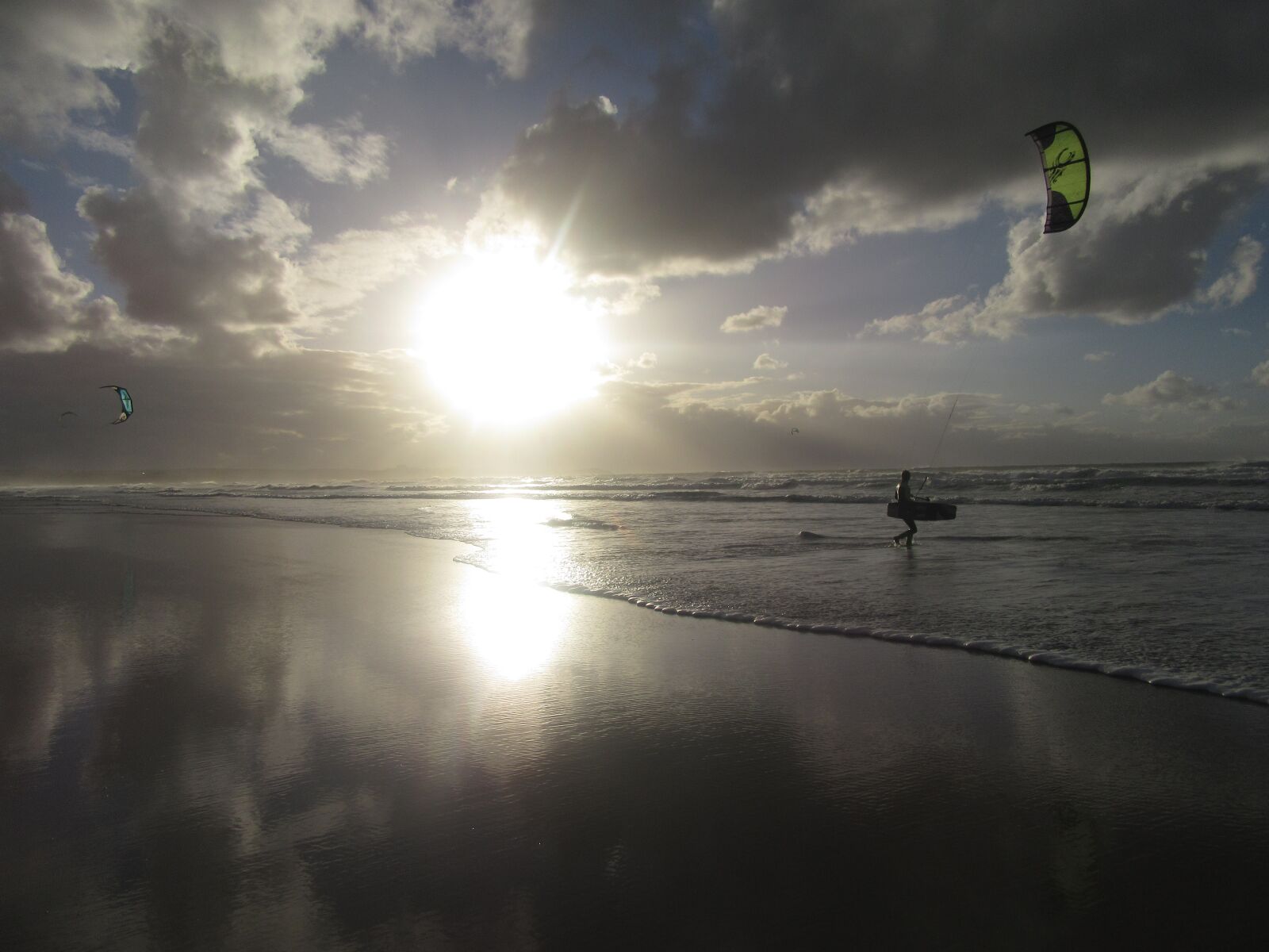Canon PowerShot SX610 HS sample photo. Ocean, kite, flying photography