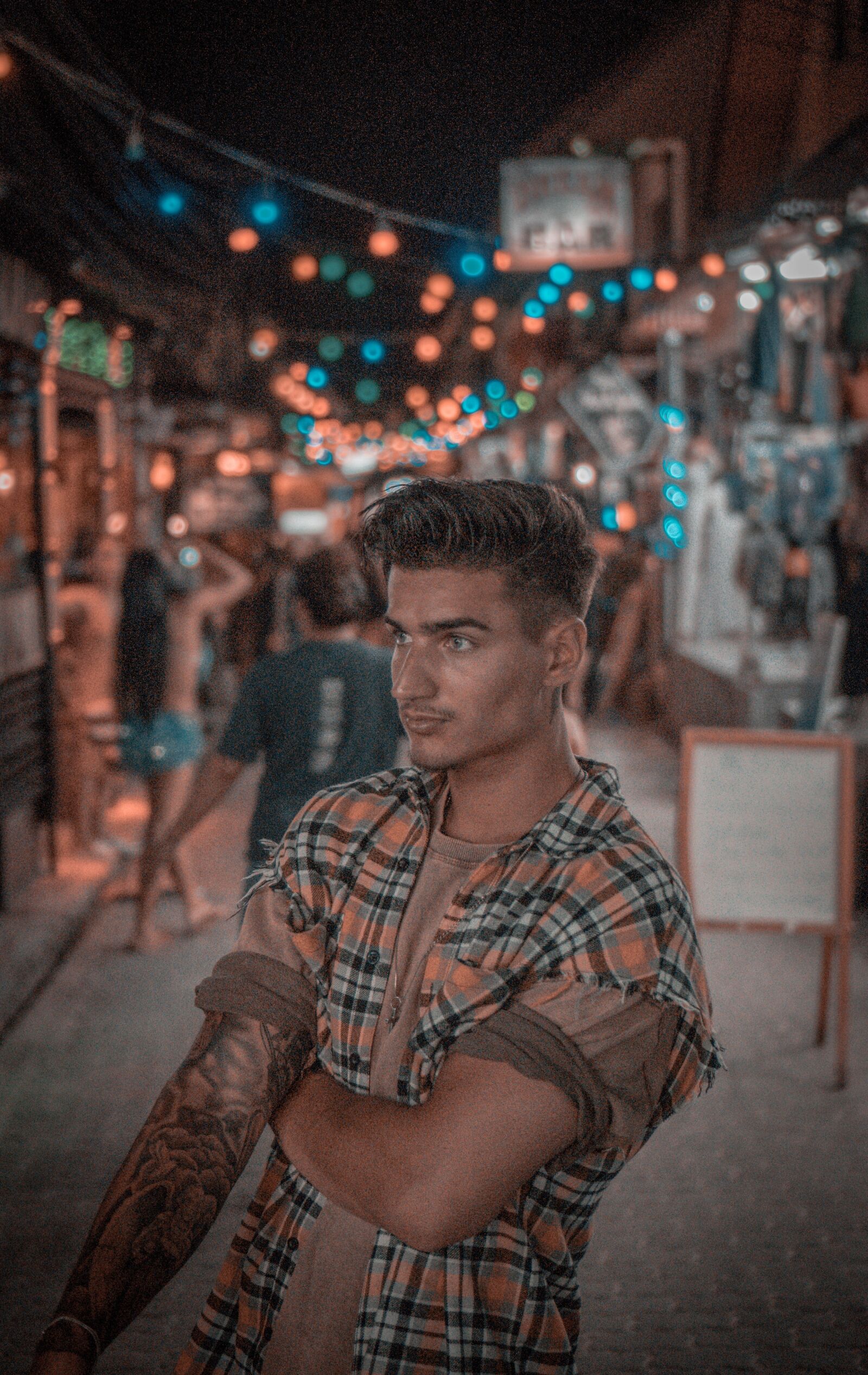 Sony E 35mm F1.8 OSS sample photo. Eys, tattoo, hair photography