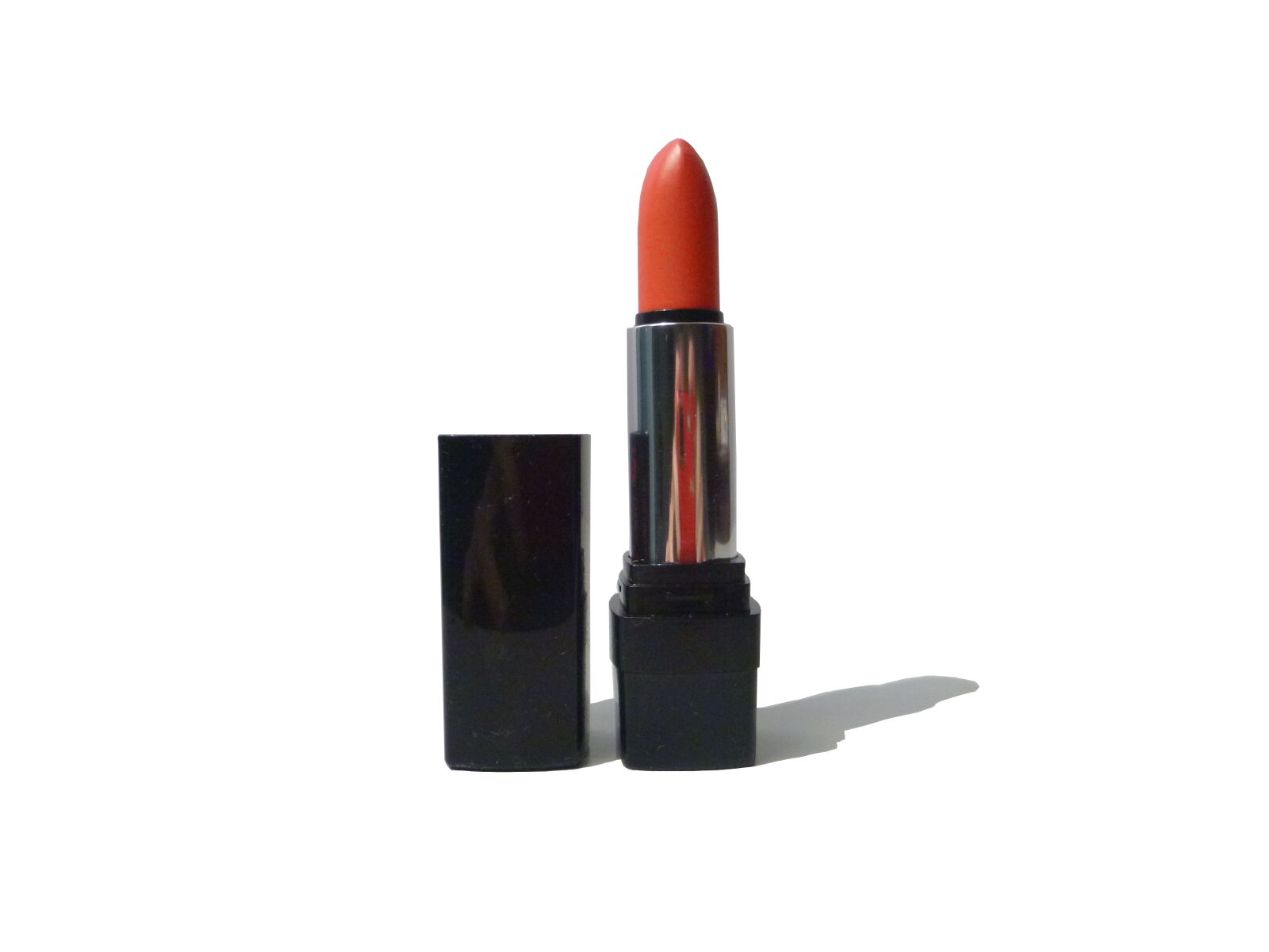 Panasonic DMC-FT25 sample photo. Orange, lipstick, with, white photography