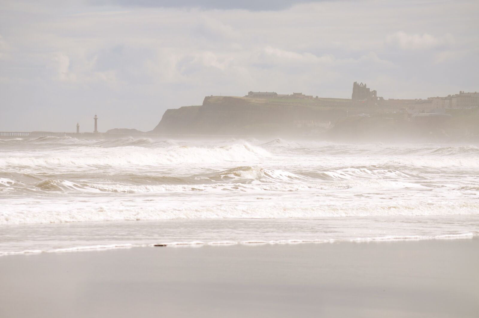 Nikon D5000 sample photo. Dunstanburgh castle, rough seas photography