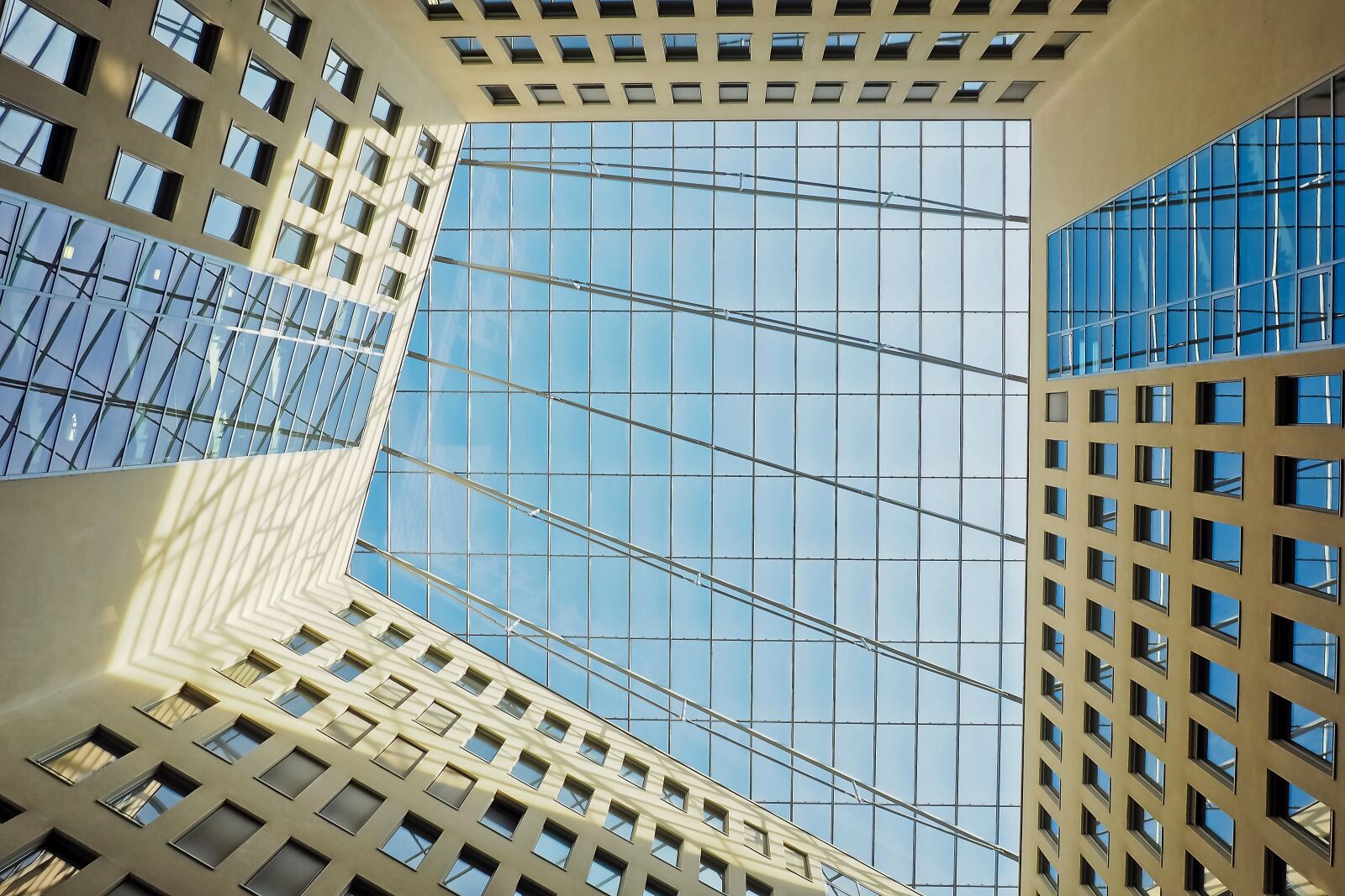 Olympus OM-D E-M10 sample photo. Architecture, skyscraper, glass facades photography