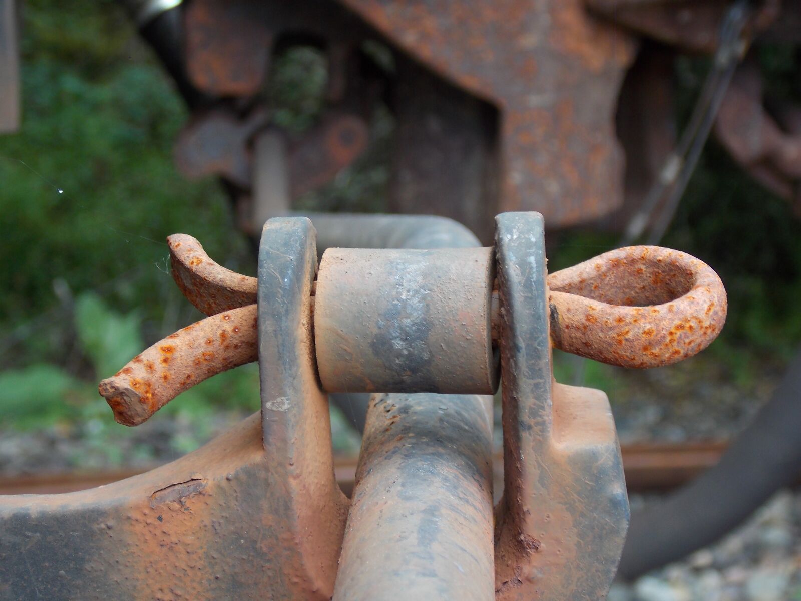 Nikon Coolpix L810 sample photo. Train, cotter pin, rust photography