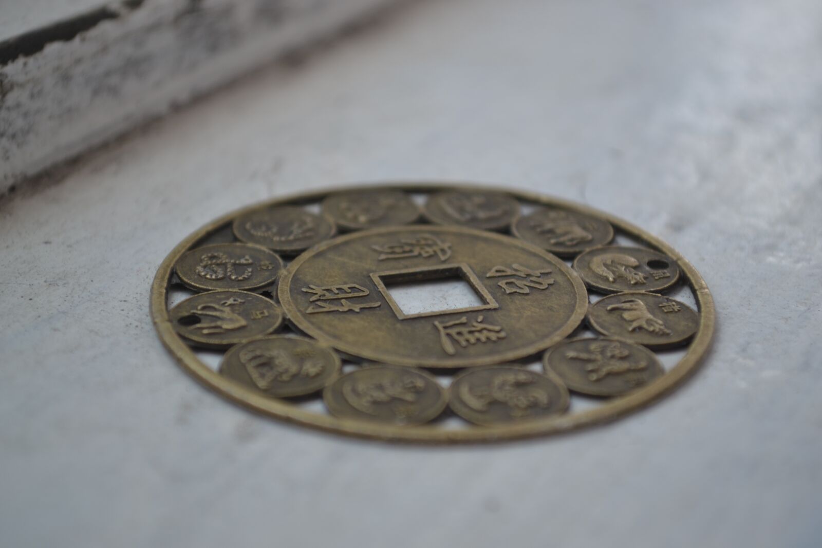 Nikon D3100 sample photo. Currency, china, medall on photography