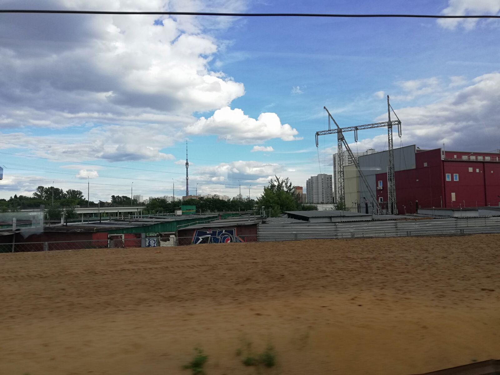 HUAWEI P20 lite sample photo. Construction, clouds, garages photography