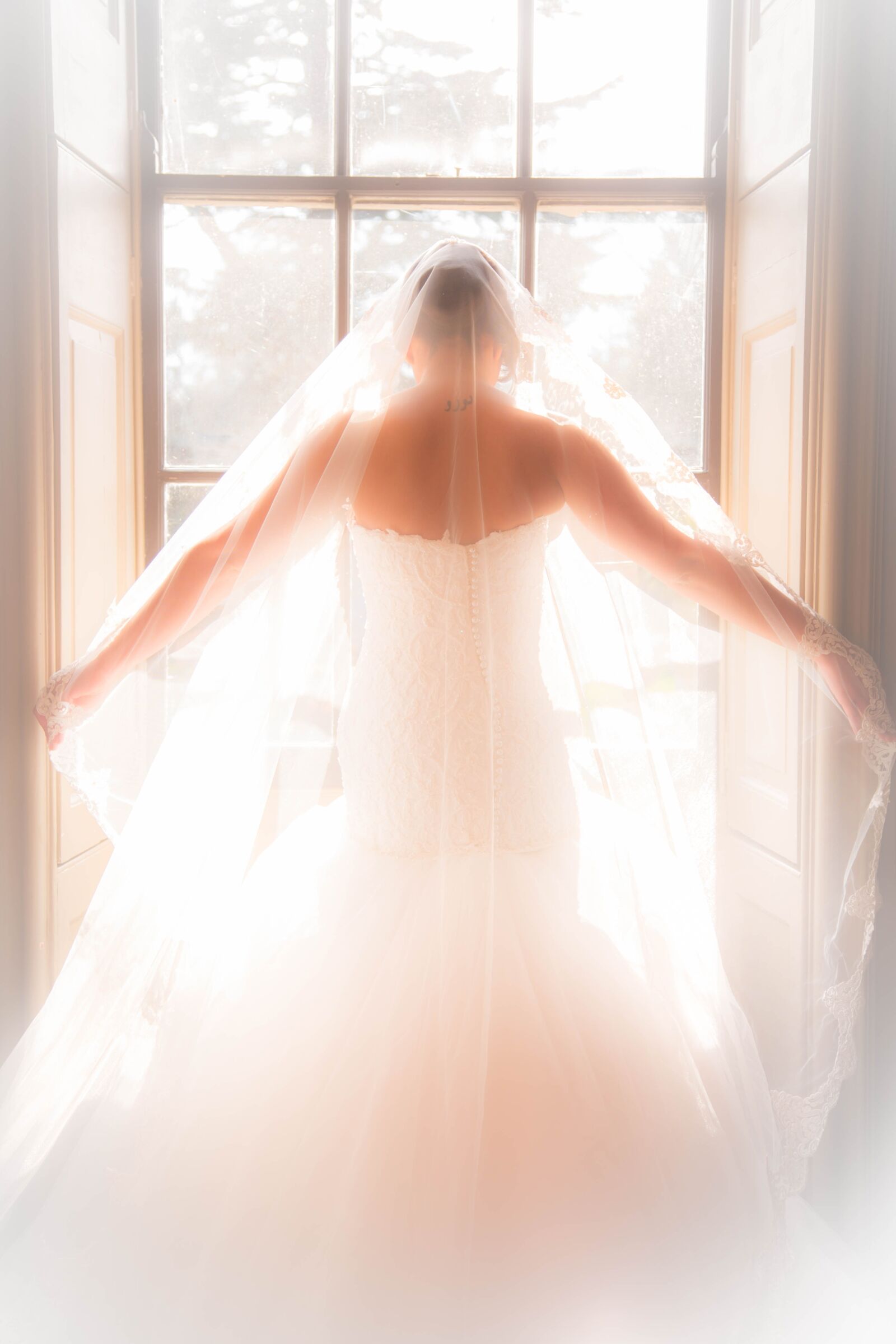 Canon EF 24-105mm F4L IS USM sample photo. Bridal, wedding dress, window photography