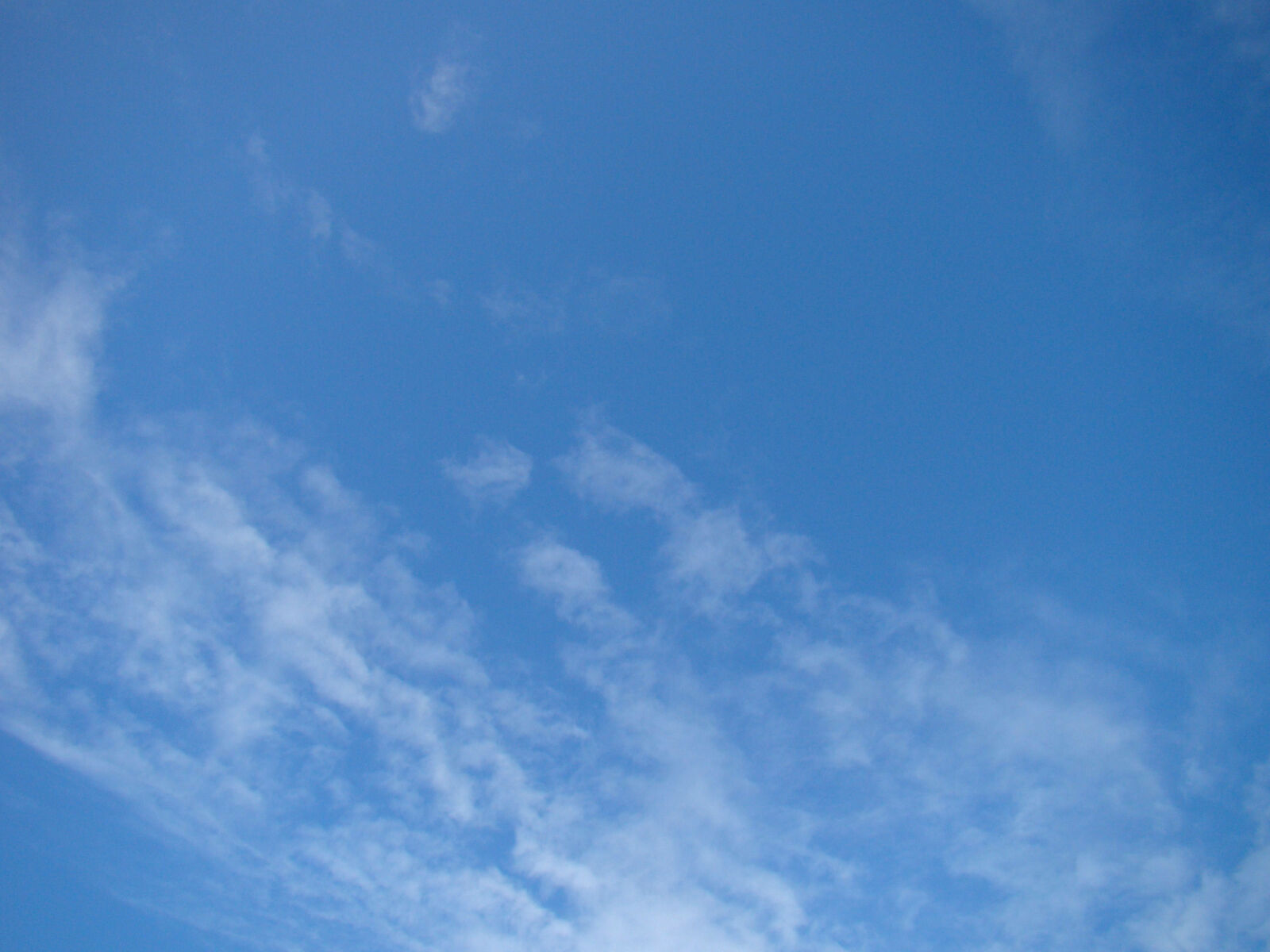 Sony Cyber-shot DSC-H50 sample photo. Blue, clouds, ireland, sky photography