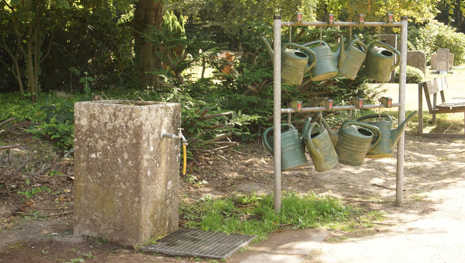 Sony a6000 sample photo. "Cemetery, watering cans, mood" photography