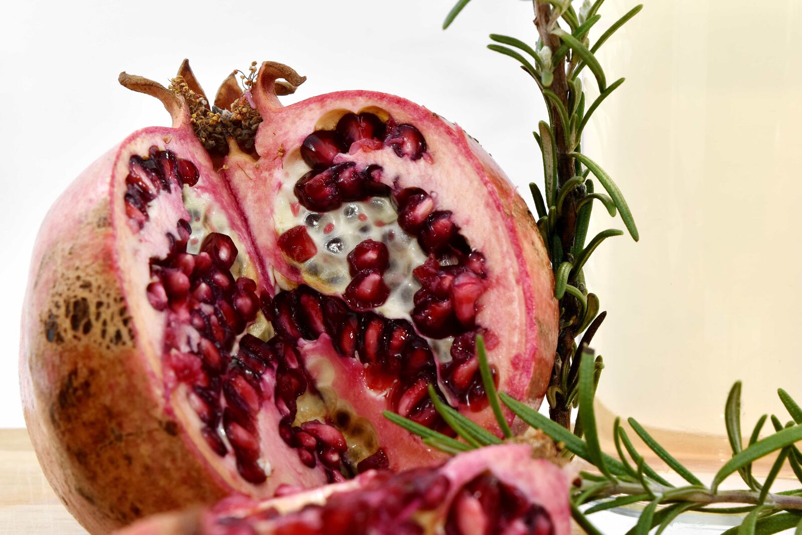 Nikon D5500 sample photo. Organic, pomegranate, rosemary, seed photography