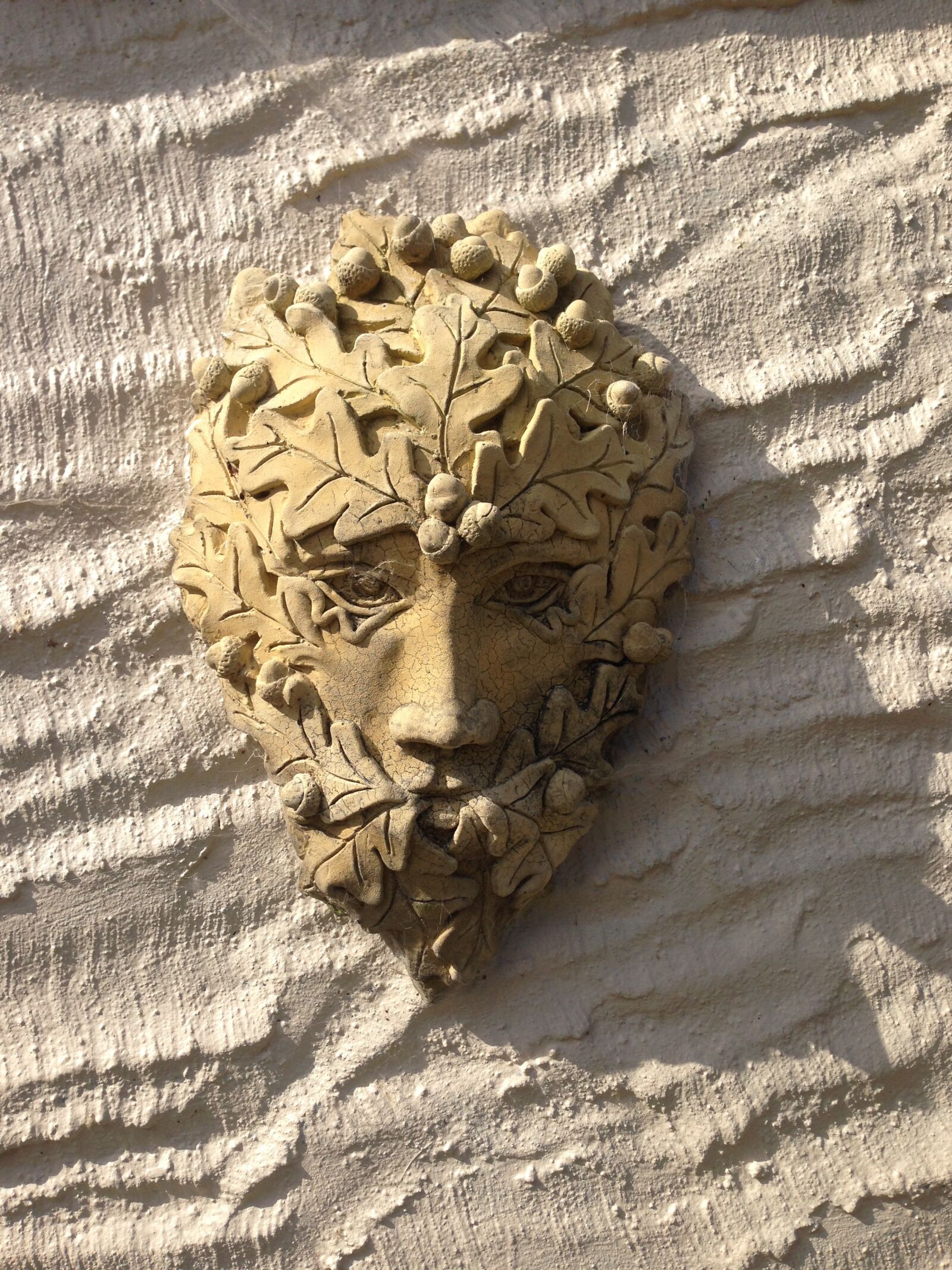 Apple iPhone 5 sample photo. Green man, wall, outdoor photography