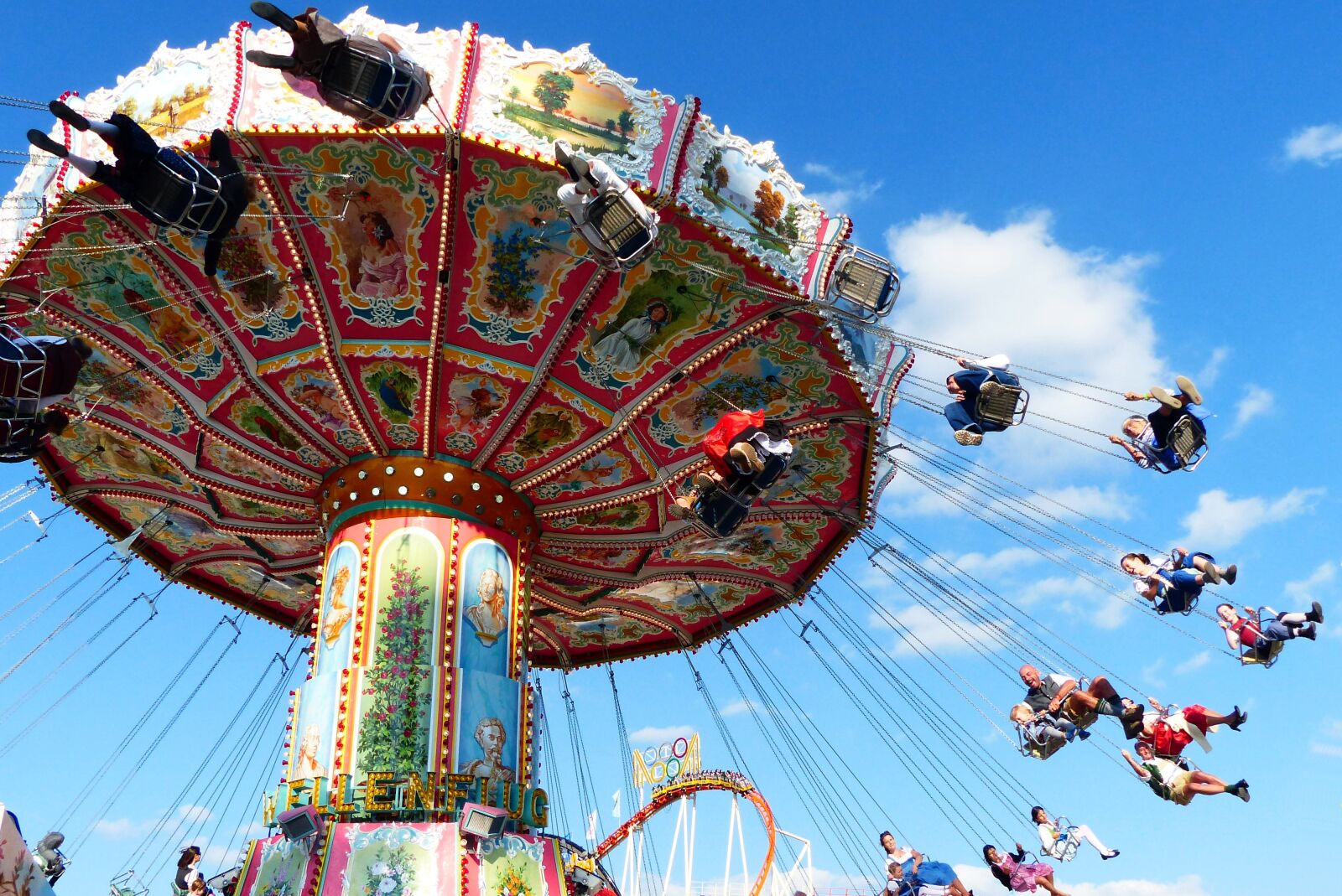 Panasonic Lumix DMC-FZ200 sample photo. Chain carousel, flying, aviator photography