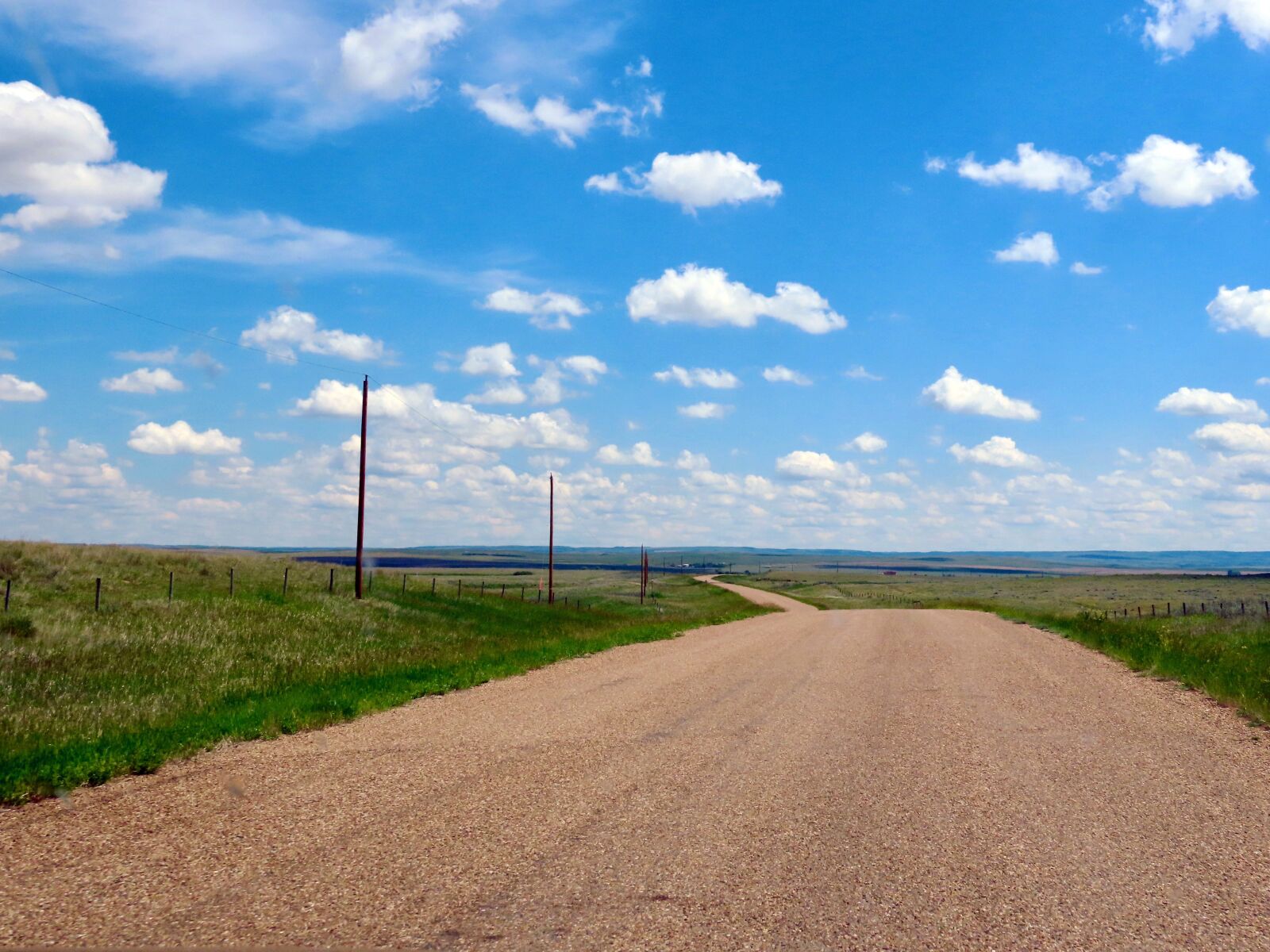 Nikon D3200 sample photo. Road, dirt, prairie photography