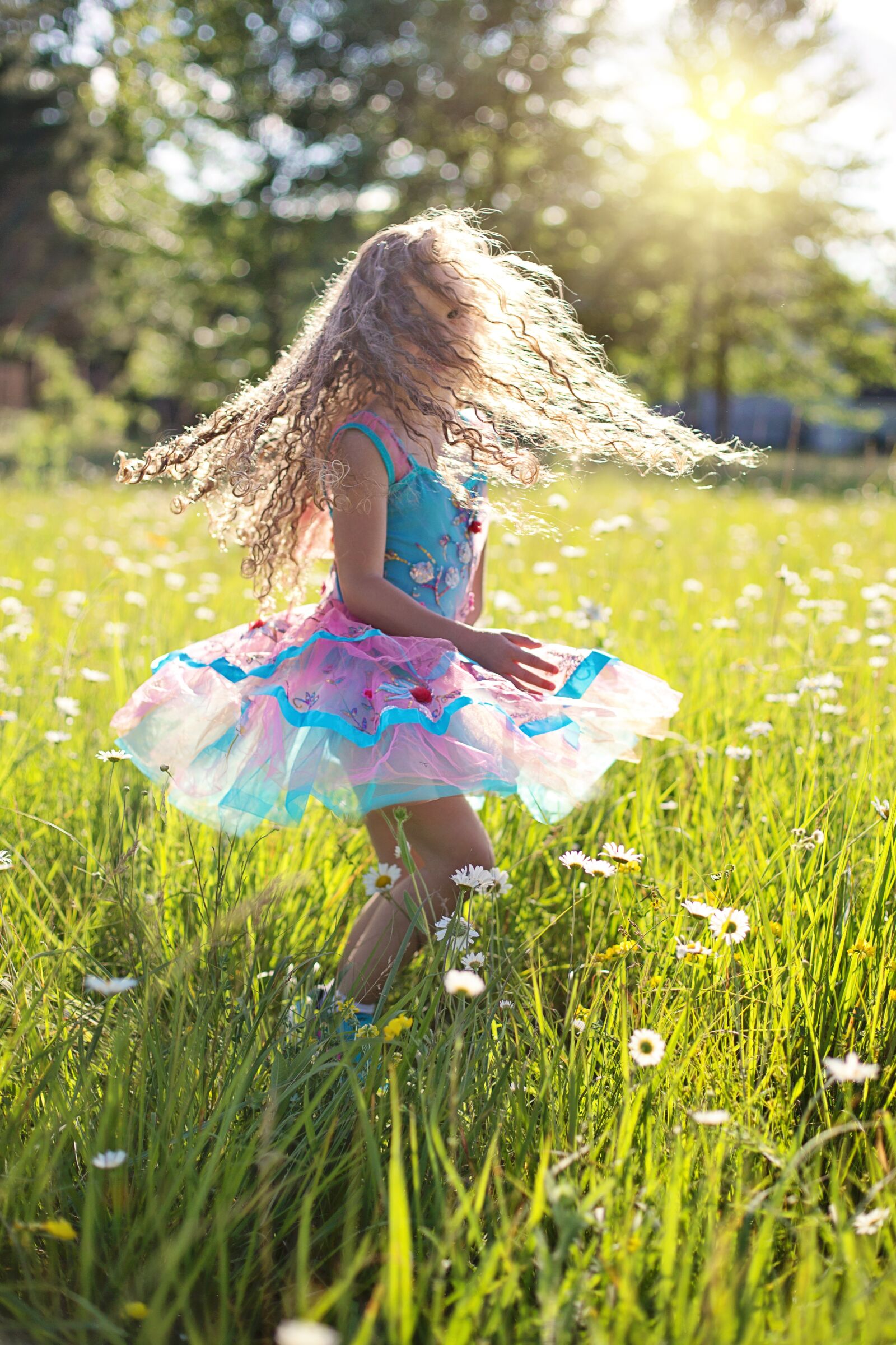 Canon EF 50mm F1.4 USM sample photo. Carefree, cheerful, child, daisies photography
