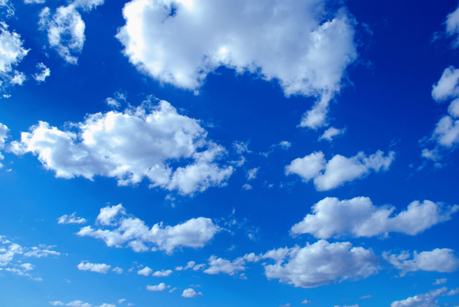 Nikon D80 sample photo. Clouds, blue, white photography