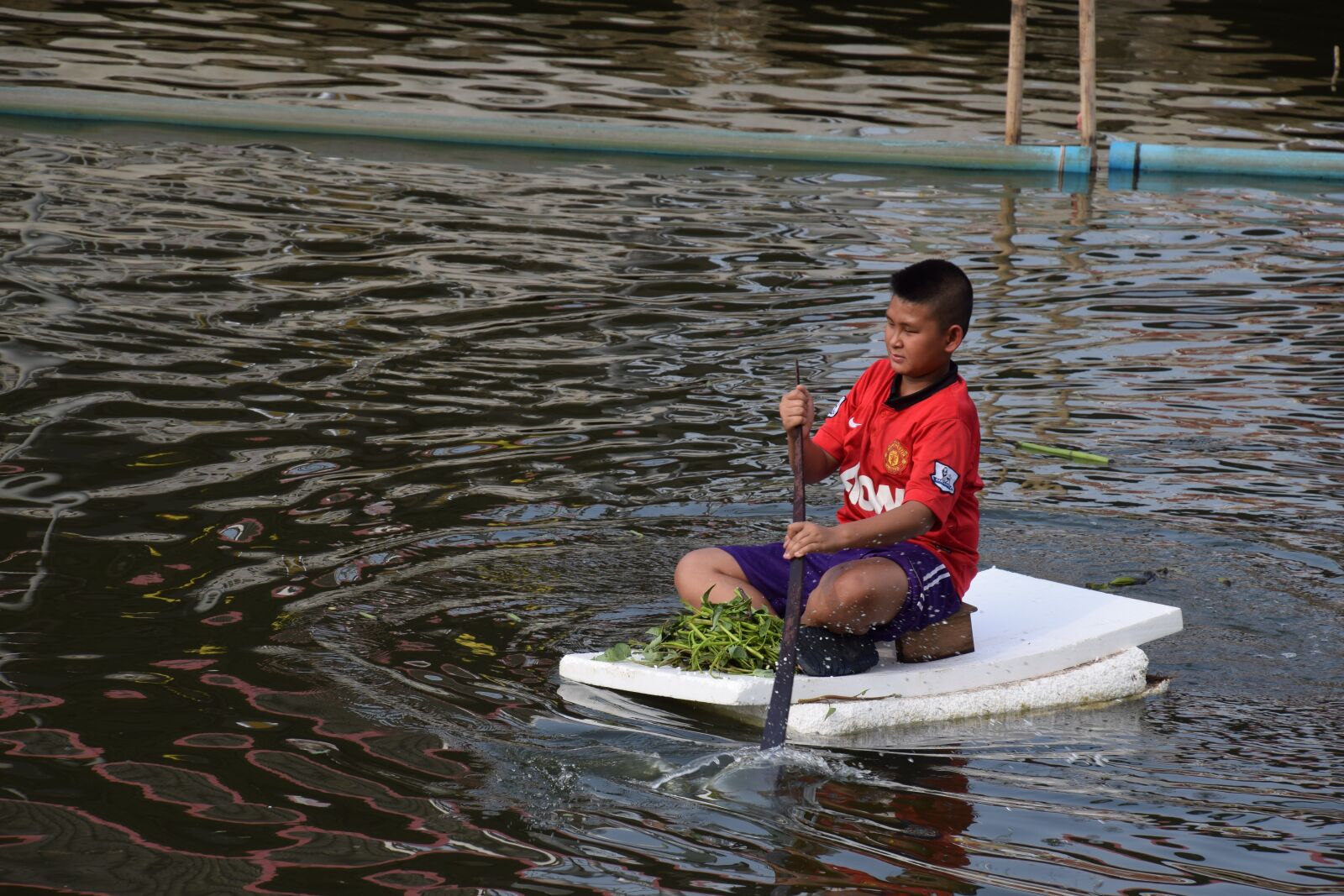 Nikon D5300 sample photo. Kid, paddle, plastic boat photography