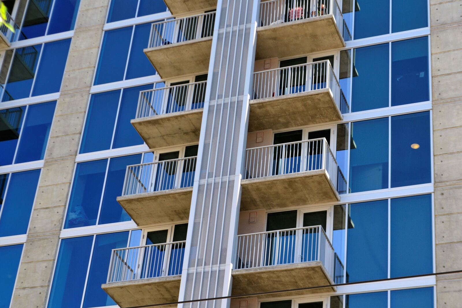 Nikon D3100 sample photo. Hotel exterior, terraces, windows photography