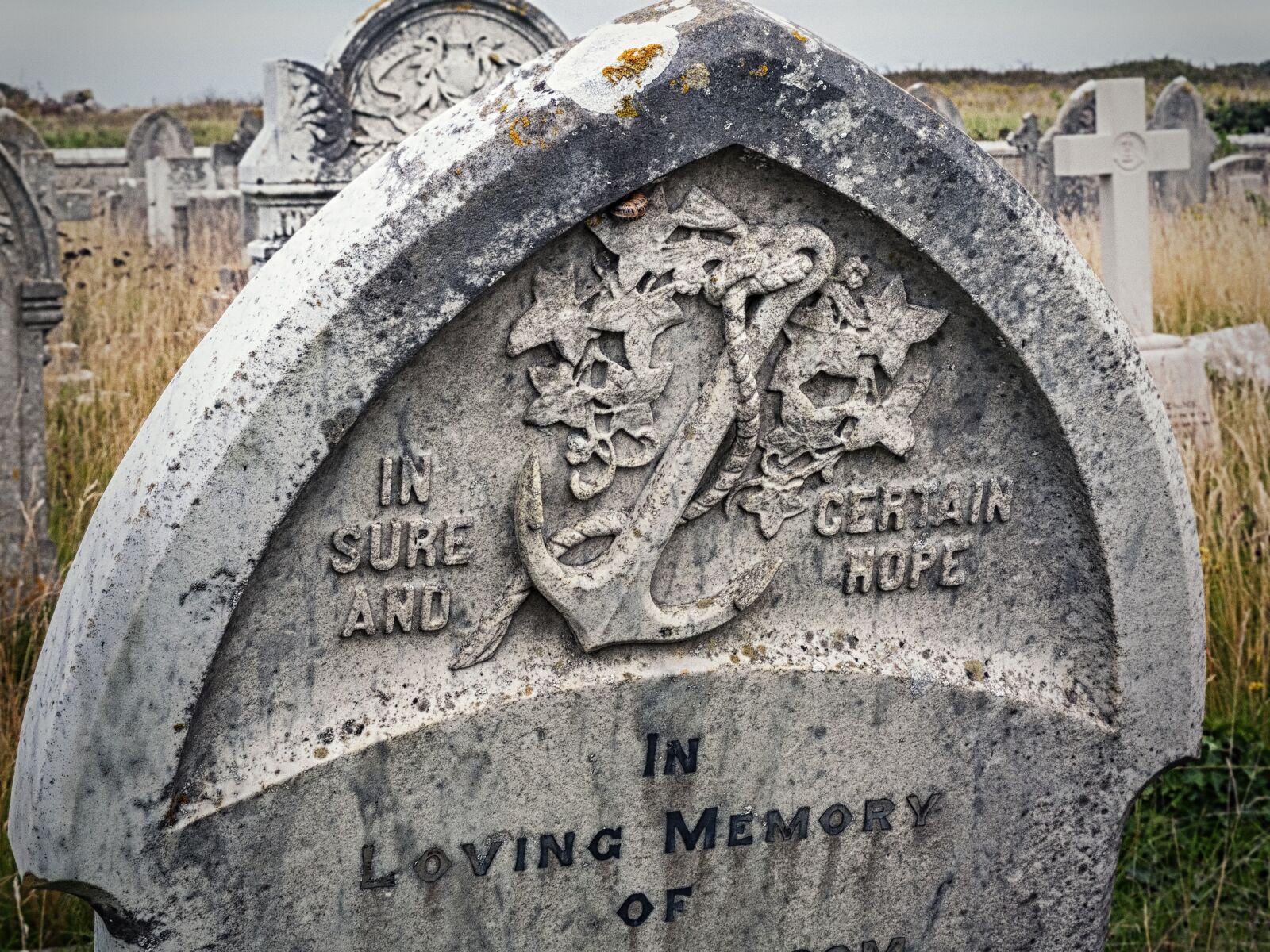 Fujifilm X10 sample photo. Stone, cemetery, sculpture photography