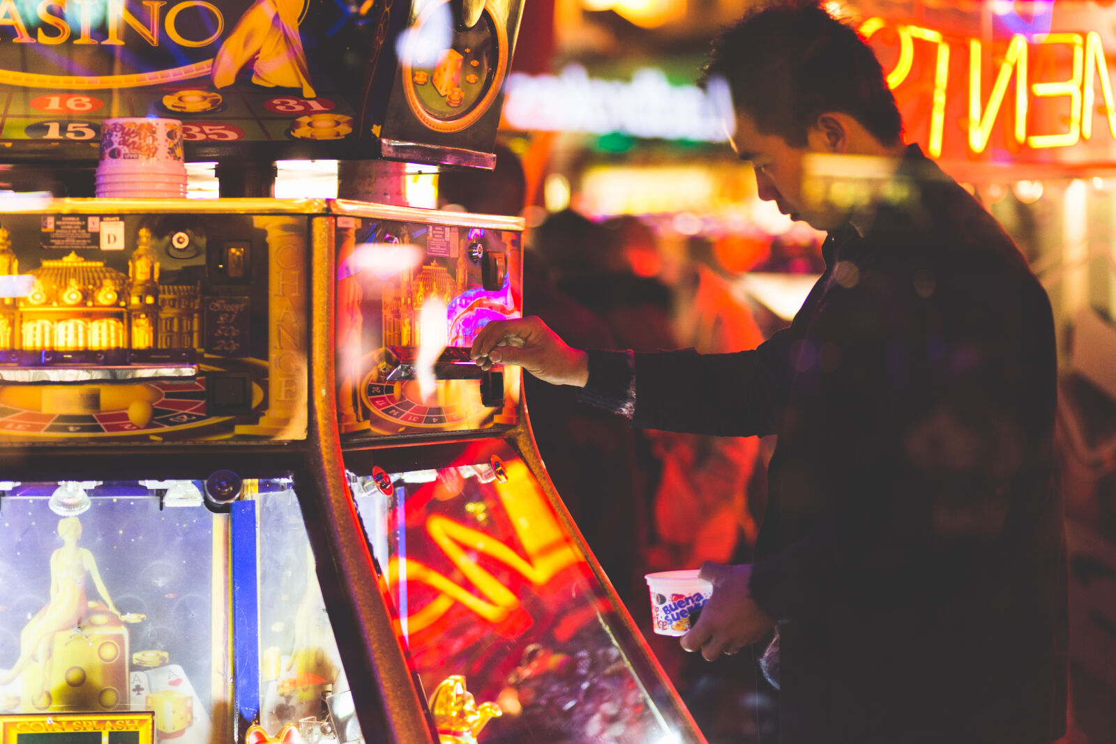 Canon EF 85mm F1.8 USM sample photo. Man, at, neon, lit photography