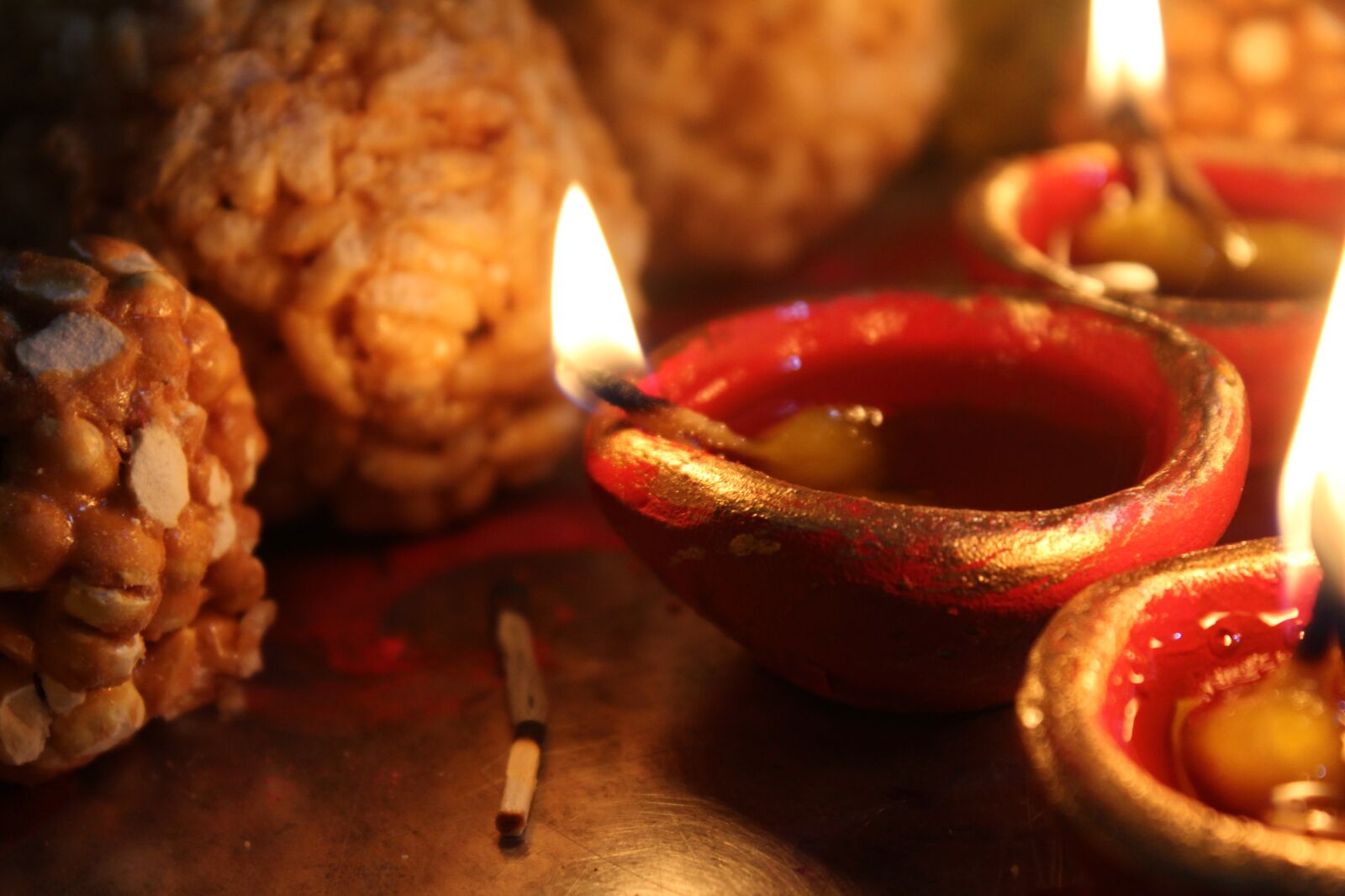 Canon EOS 1200D (EOS Rebel T5 / EOS Kiss X70 / EOS Hi) sample photo. Diya, sweets, red photography
