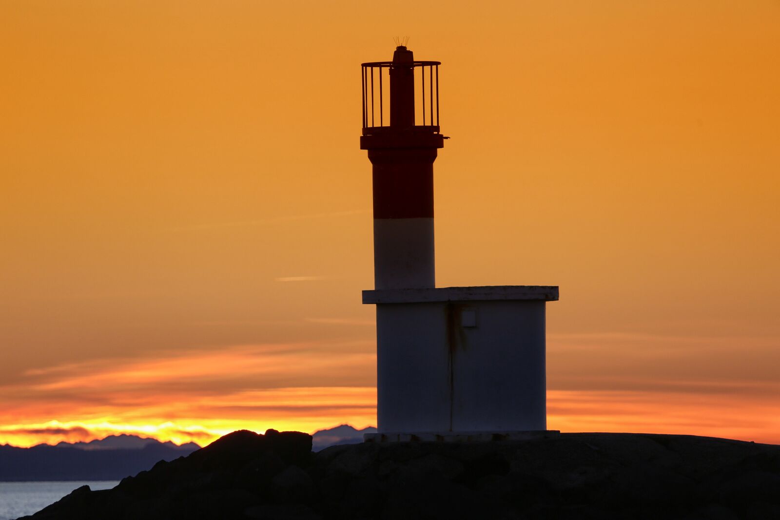 Canon EF 100-400mm F4.5-5.6L IS USM sample photo. Sun, lighthouse, sea photography