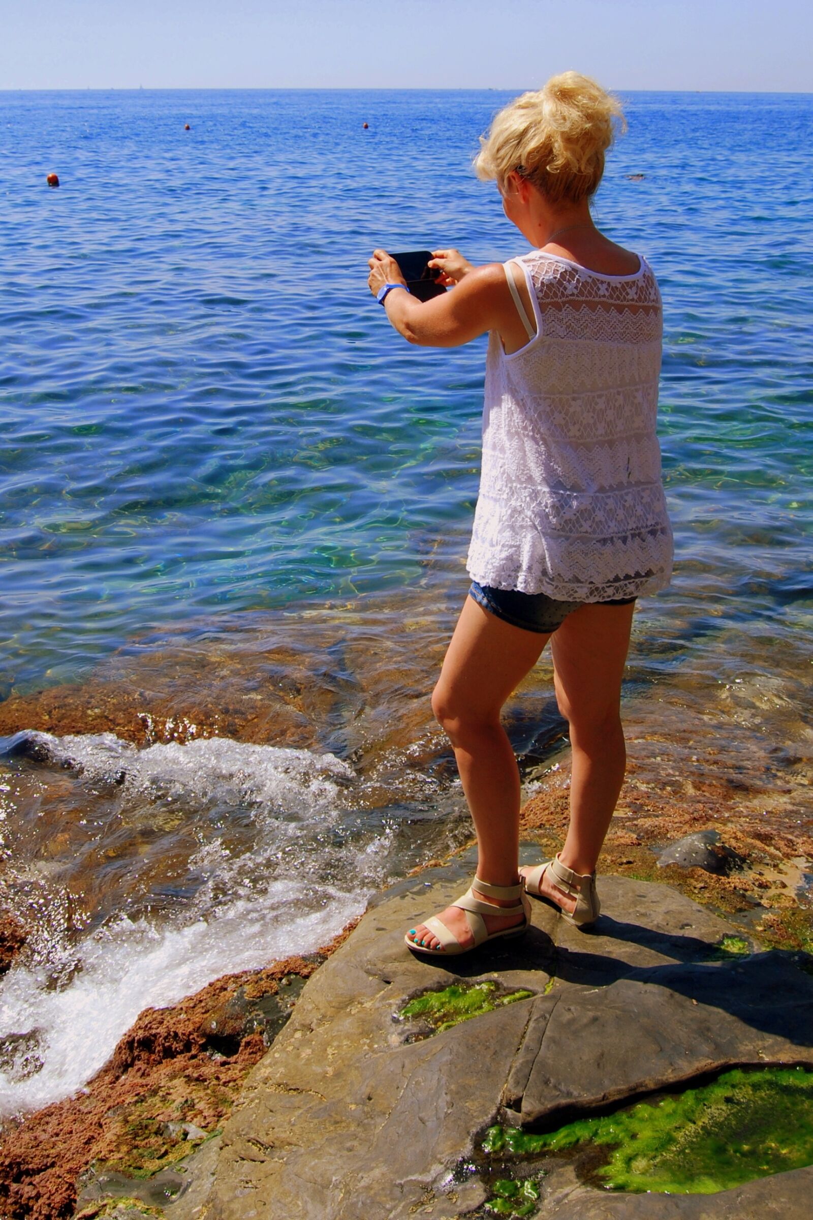 Nikon D60 sample photo. Photographer, rocks, woman photography