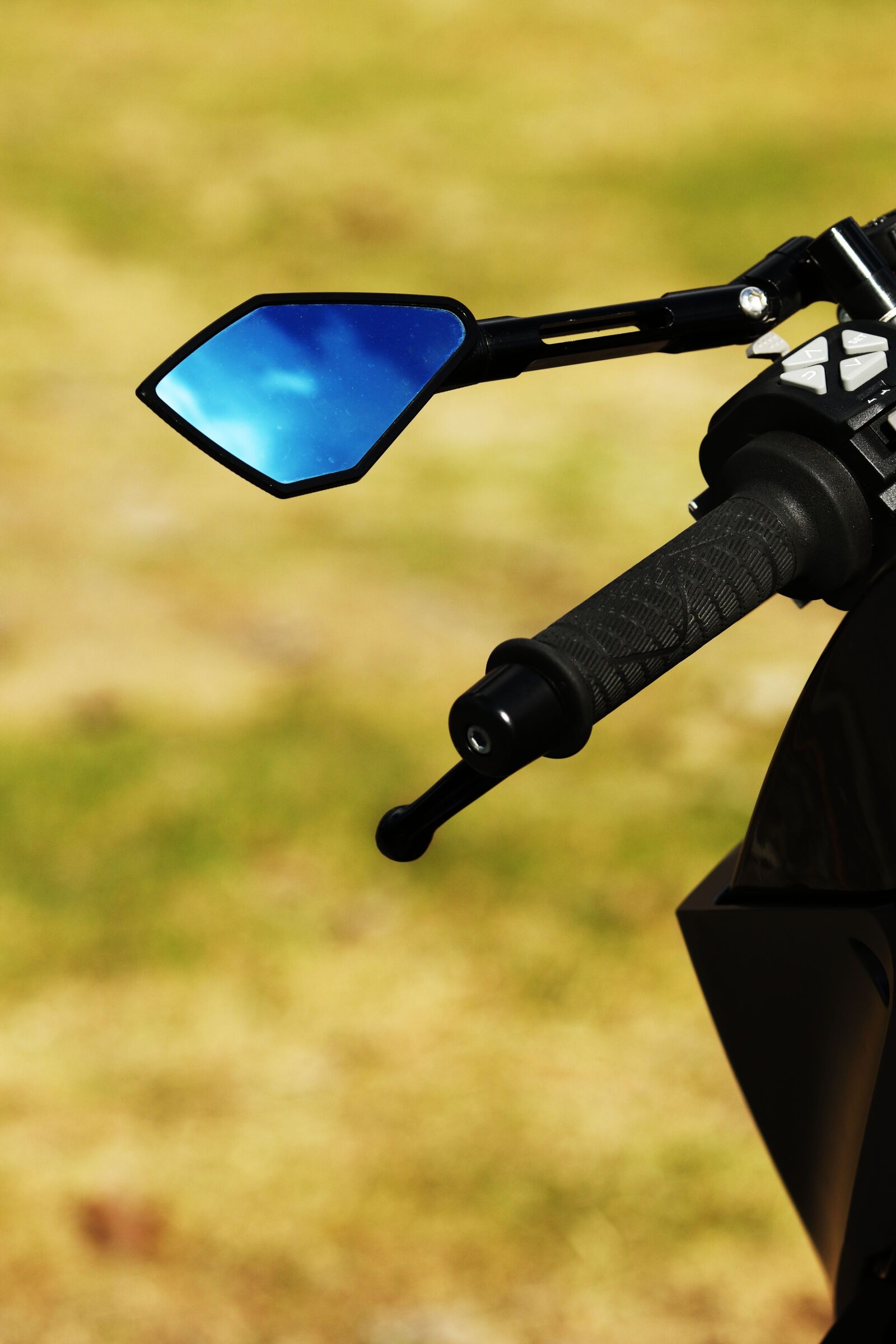 Canon EOS 7D Mark II + Canon EF 135mm F2L USM sample photo. Motorcycle, motorbike, steering wheel photography