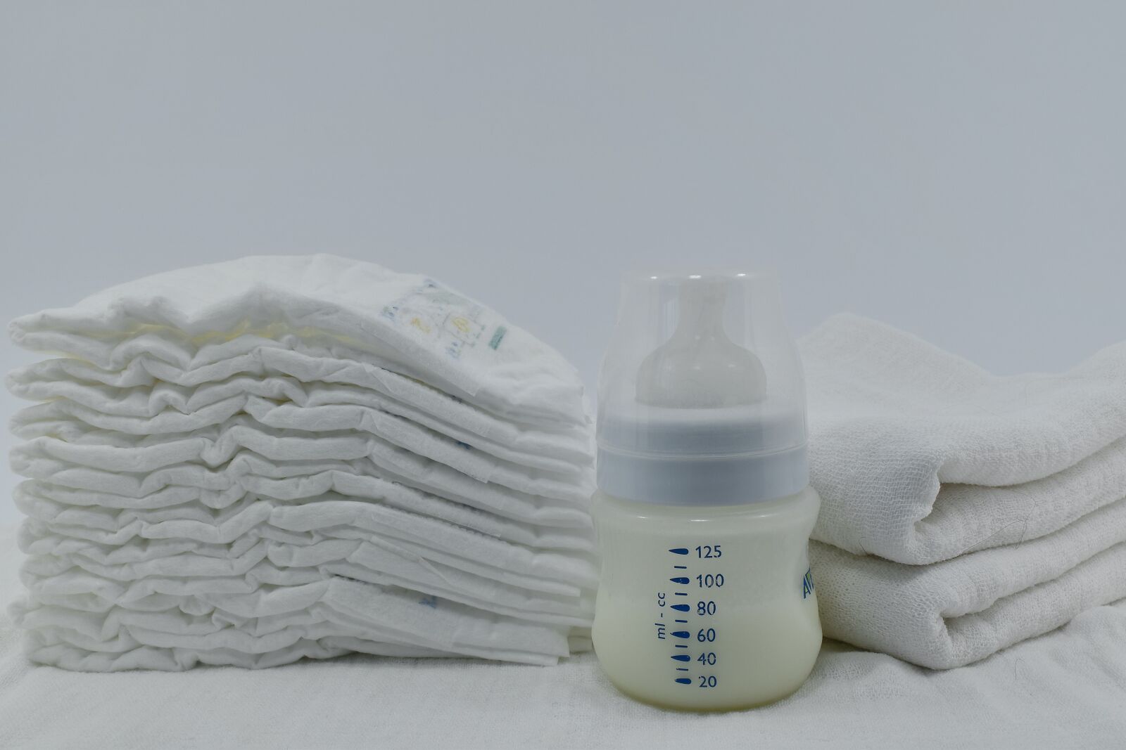 Nikon D5500 sample photo. Baby, diaper, milk, bottle photography