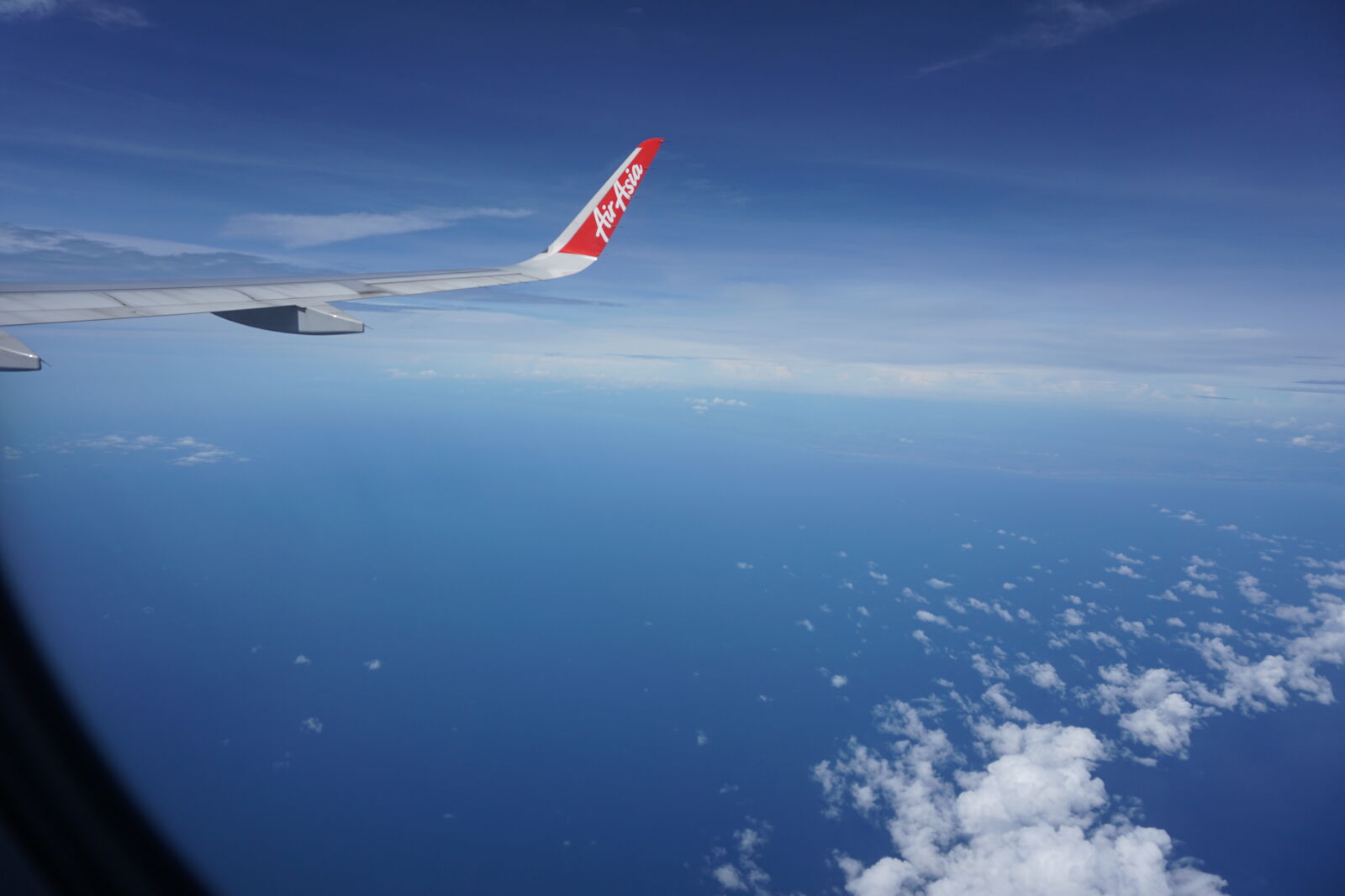 Sony a5100 + Sony E 16-50mm F3.5-5.6 PZ OSS sample photo. Airasia, airplane, fly, top photography