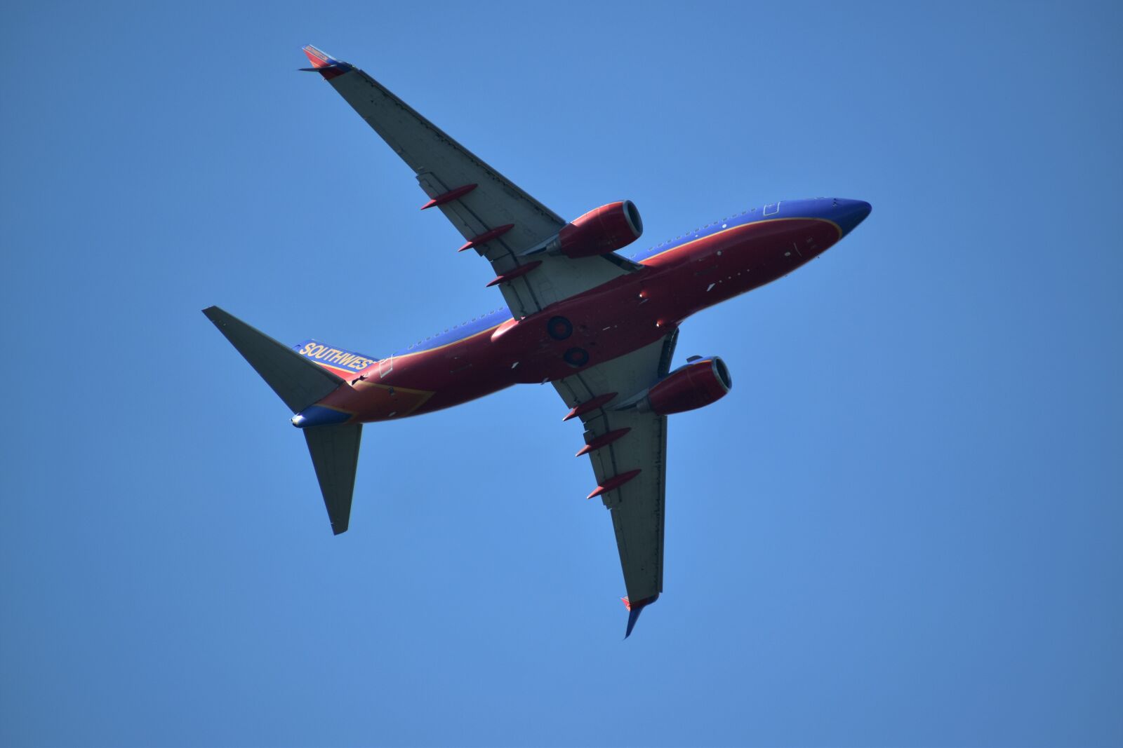 Nikon D3500 sample photo. Airplane, underbelly, southwest photography