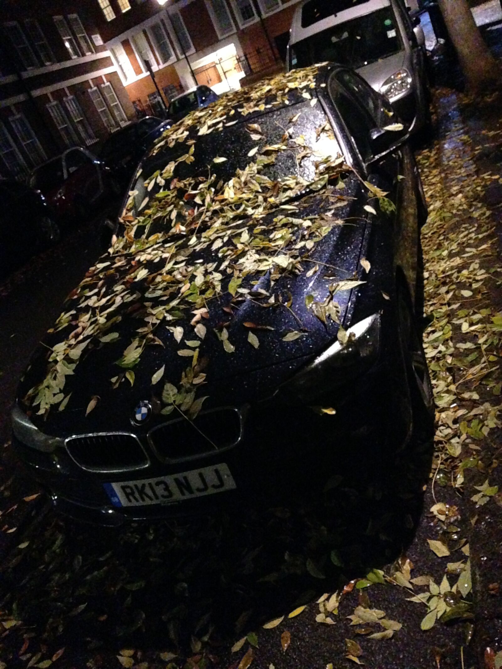 iPhone 5 back camera 4.12mm f/2.4 sample photo. Car, leaves, autumn photography