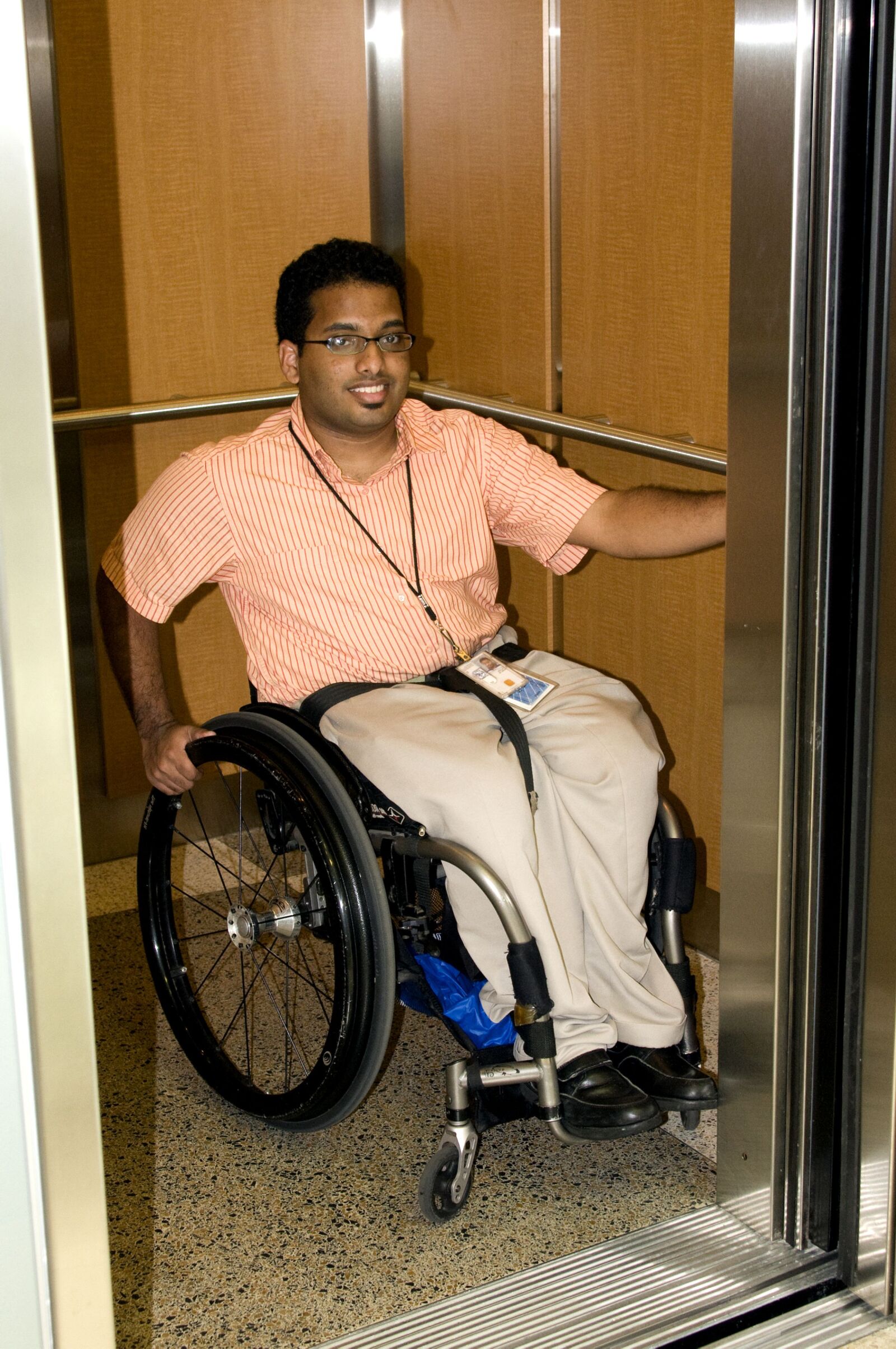 Nikon D300 sample photo. Man, wheelchair, boarded, elevator photography