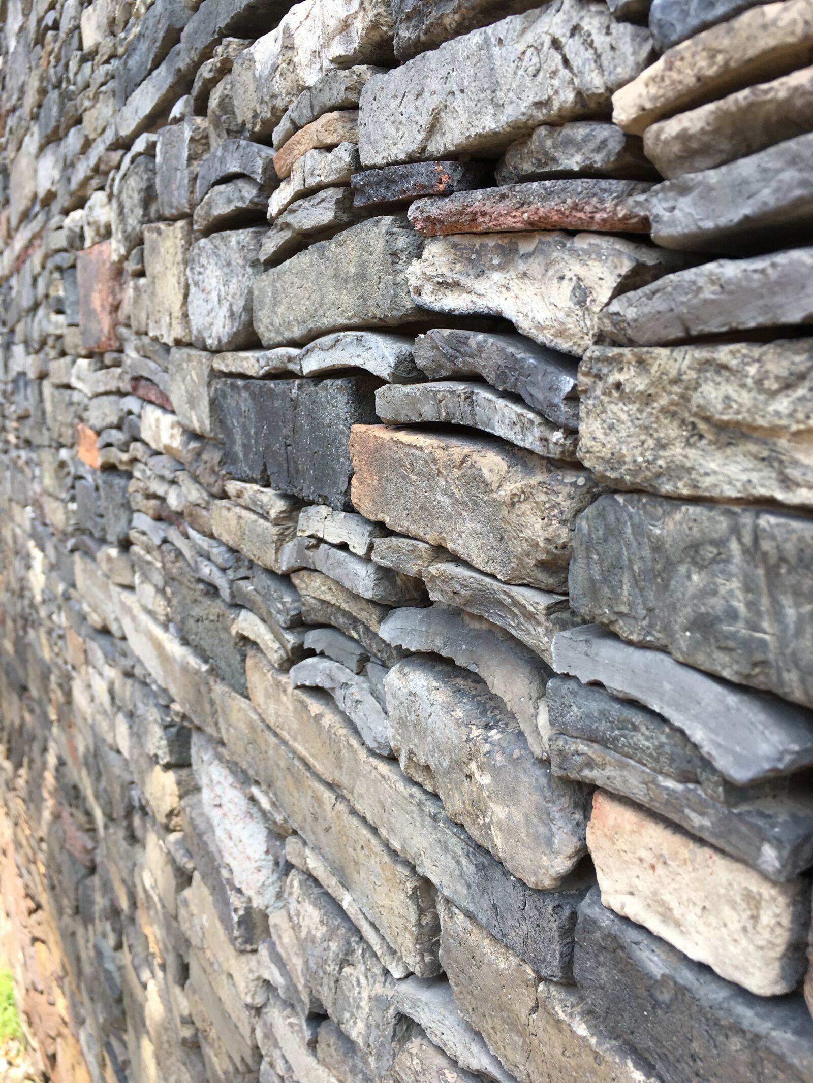 Apple iPhone 6s sample photo. Brick, wall, rock, wall photography