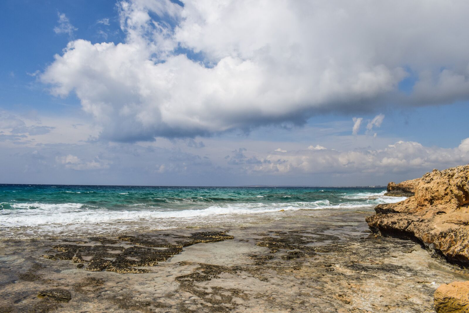 Nikon D3300 sample photo. Rocky coast, sky, clouds photography