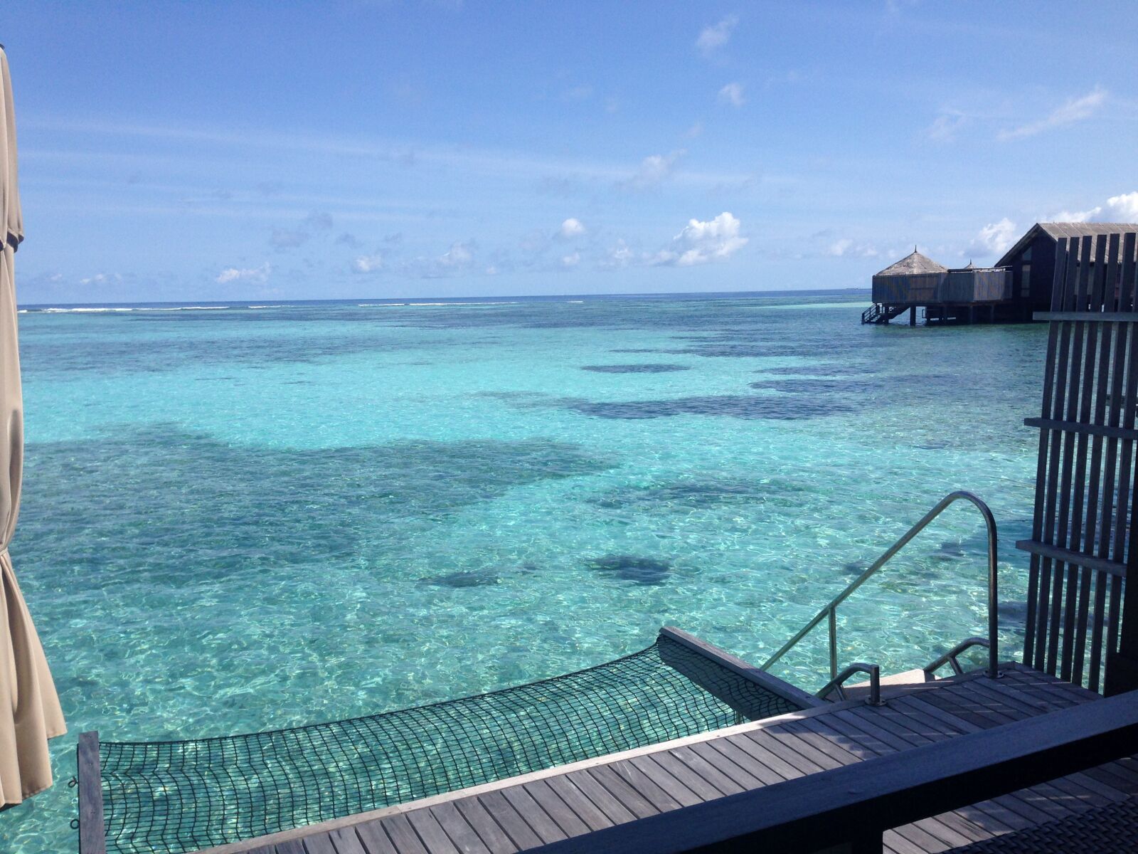 iPhone 5 back camera 4.12mm f/2.4 sample photo. Over water, bungalow, maldives photography