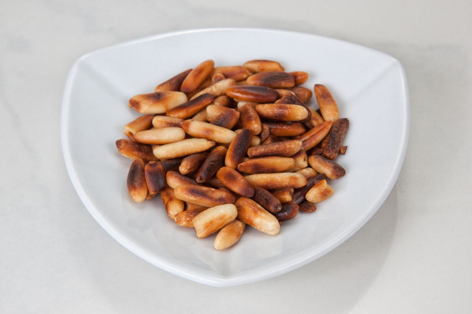 Canon EF 24-70mm F2.8L USM sample photo. Pine nuts, roasted, toasted photography