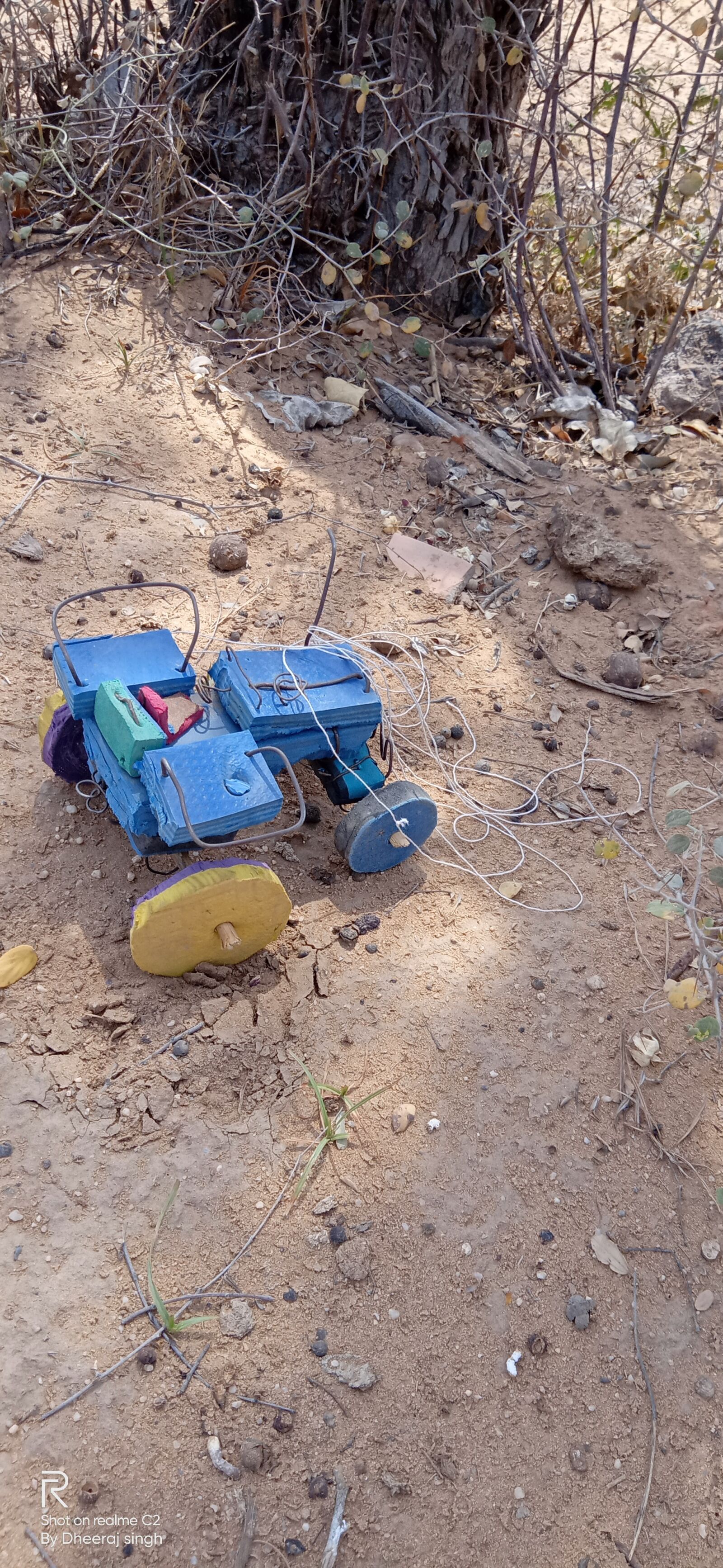 Realme C2 sample photo. Tractor, children's tractor, toy photography