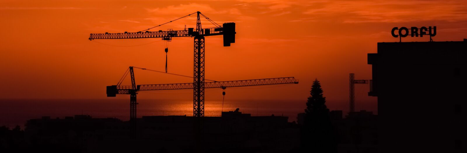 Nikon D3300 sample photo. Cranes, sunset, construction photography