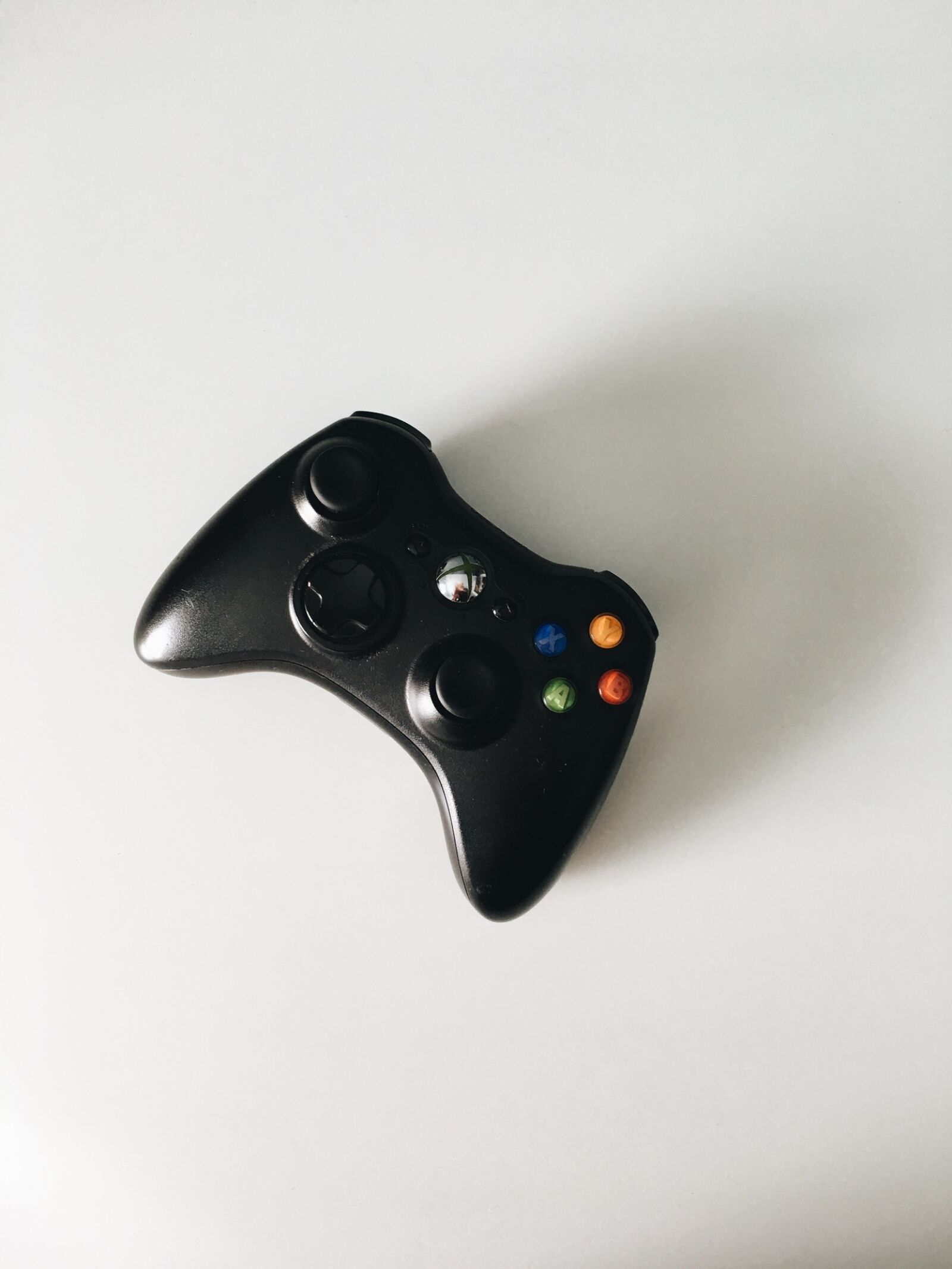 iPhone 6s Plus back camera 4.15mm f/2.2 sample photo. Black, controller, game, game photography