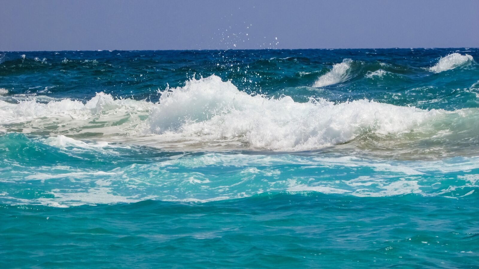 Canon PowerShot SX400 IS sample photo. Wave, beach, spray photography