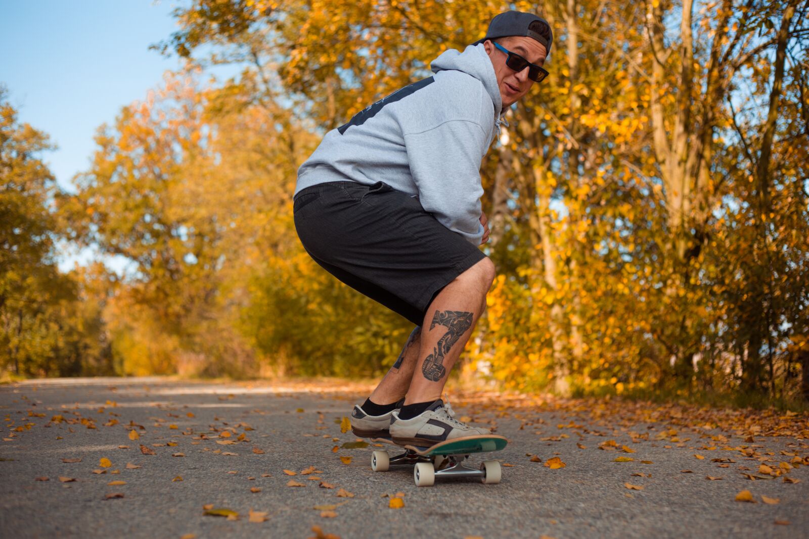 Canon EF 50mm F1.8 II sample photo. Skateboard, man, autumn photography