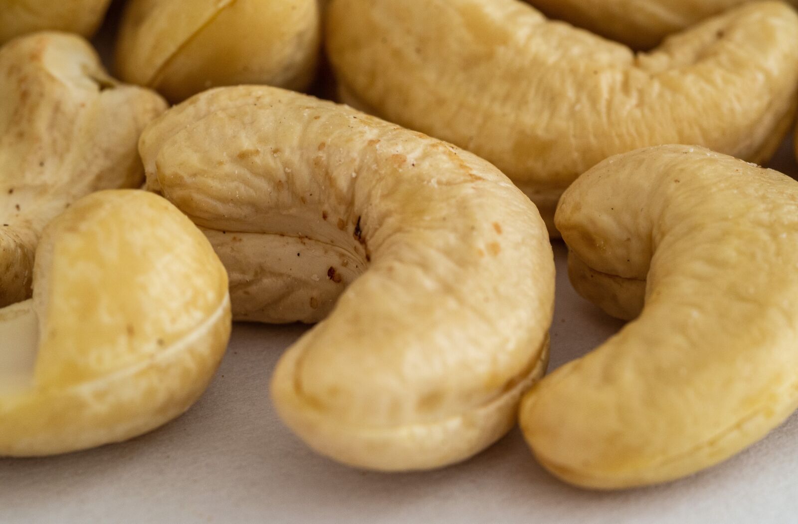 Olympus OM-D E-M10 III sample photo. Cashew, nuts, nutrition photography