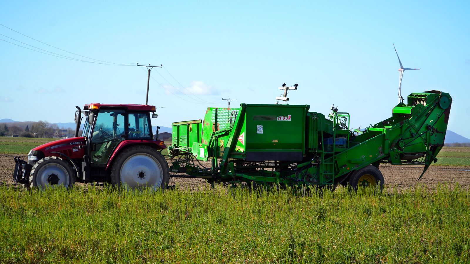 Sony E PZ 18-105mm F4 G OSS sample photo. Tractor, harvester, agricultural machine photography