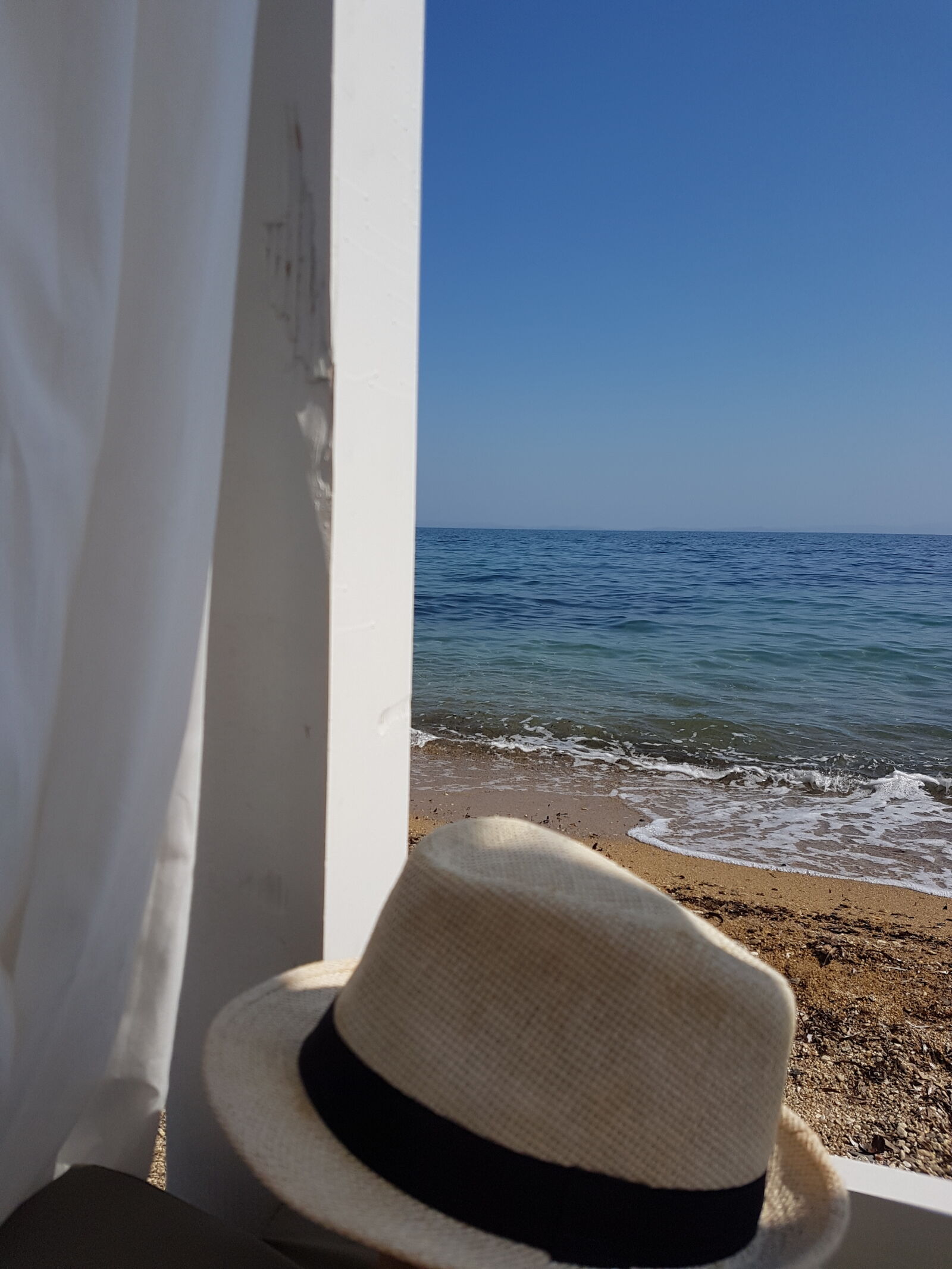 Samsung Galaxy S7 sample photo. Baldachin, sea, sun, hat photography